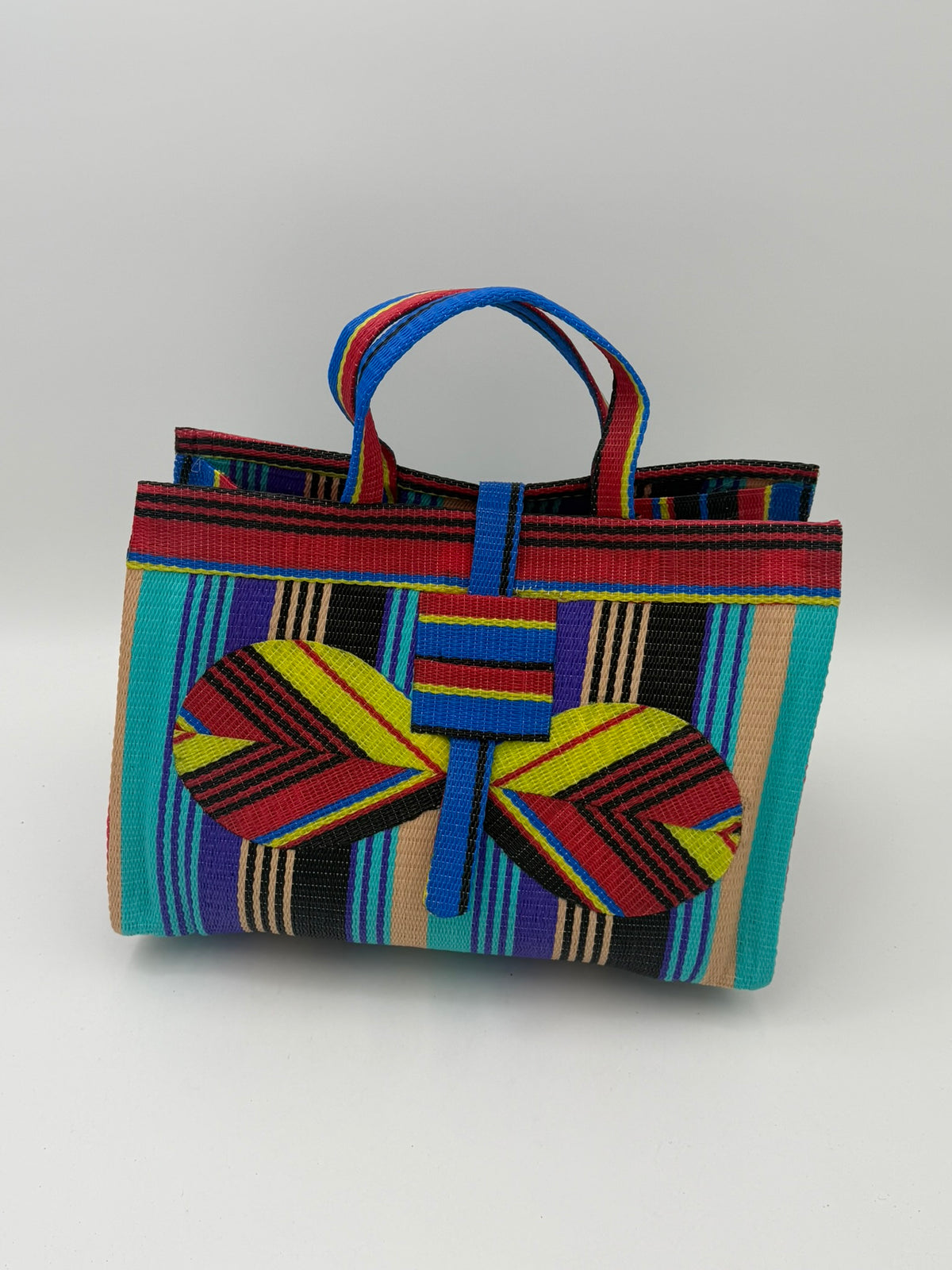 Africana Large handwoven tote bag by SCRUBIES in Red,Yellow,Teal,Purple,Beige,Black with Stripes design and Bow accent pattern