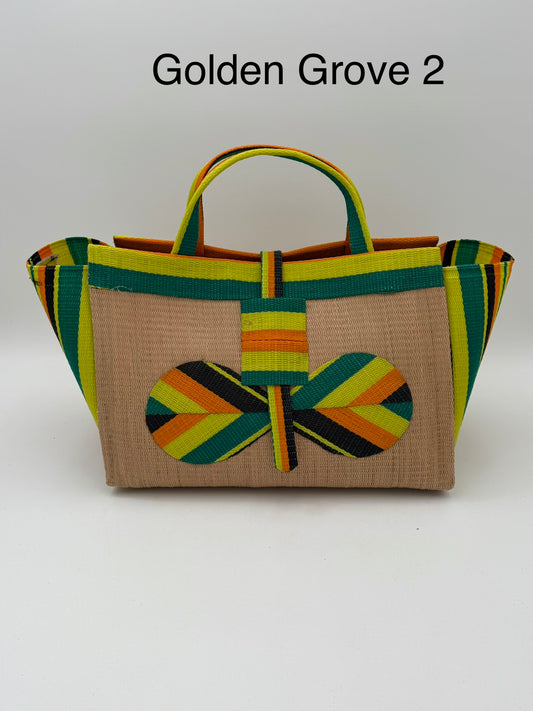 Sunshine Large handwoven tote bag by SCRUBIES in Beige,Yellow,Orange,Green,Black with Solid design and Bow accent pattern