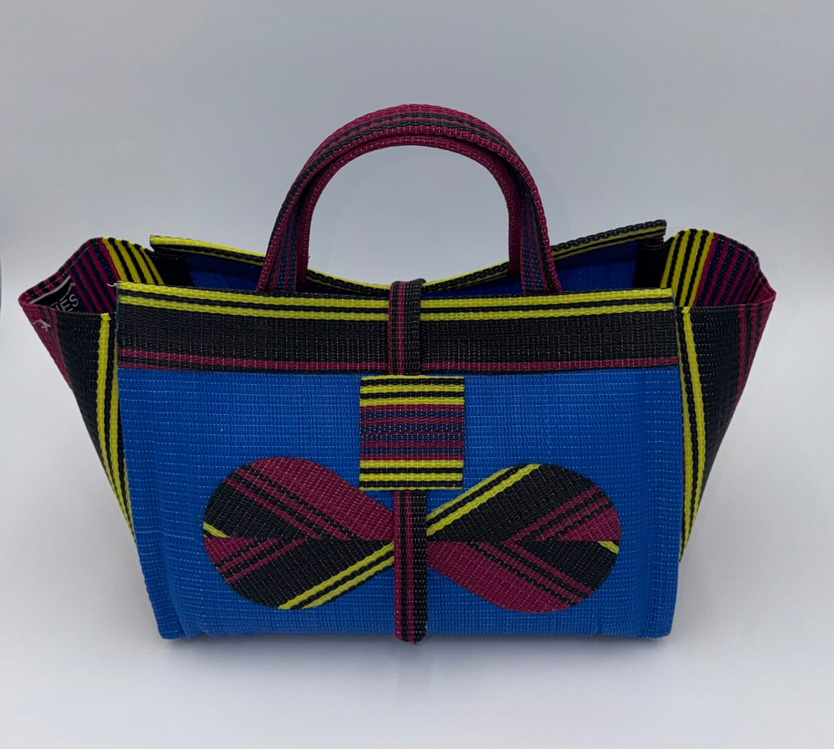 Lagoon Large handwoven tote bag by SCRUBIES in Blue,Wine,Yellow,Black with Solid design and Bow accent pattern