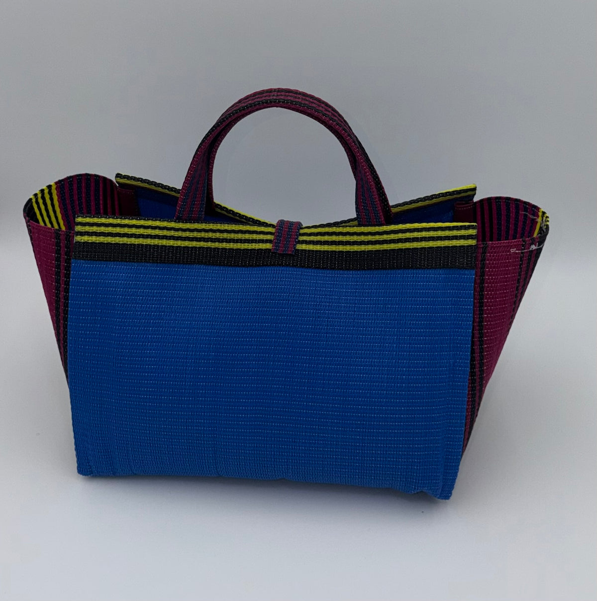 Lagoon Large handwoven tote bag by SCRUBIES in Blue,Wine,Yellow,Black with Solid design and Leaf accent pattern