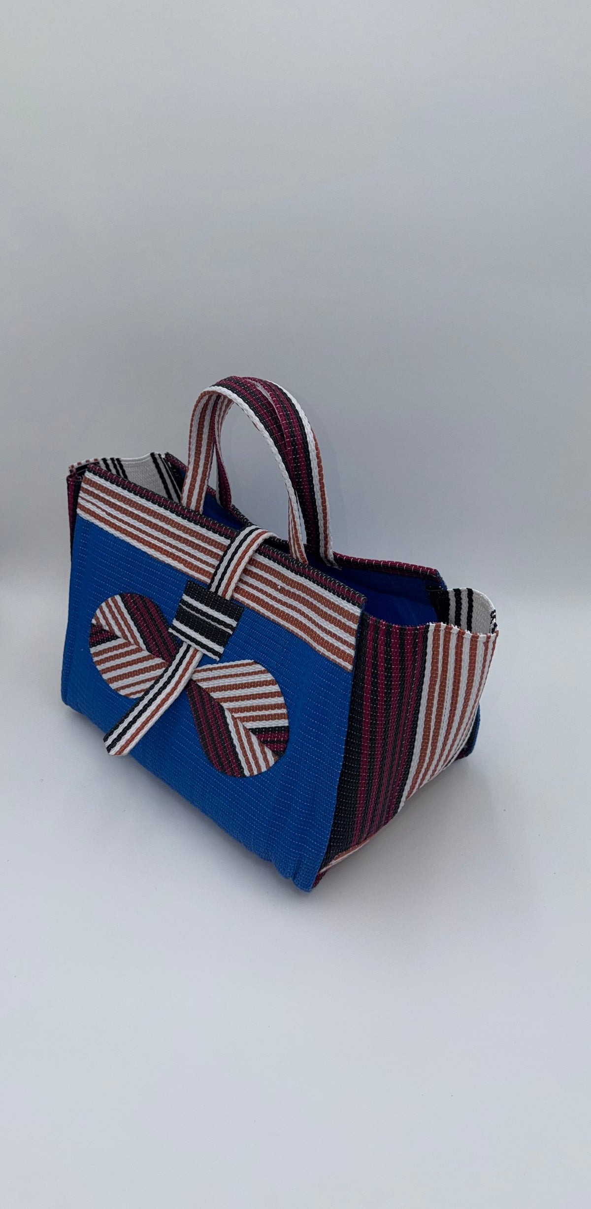 Lagoon Large handwoven tote bag by SCRUBIES in Blue,White,Wine with Solid design and Bow accent pattern