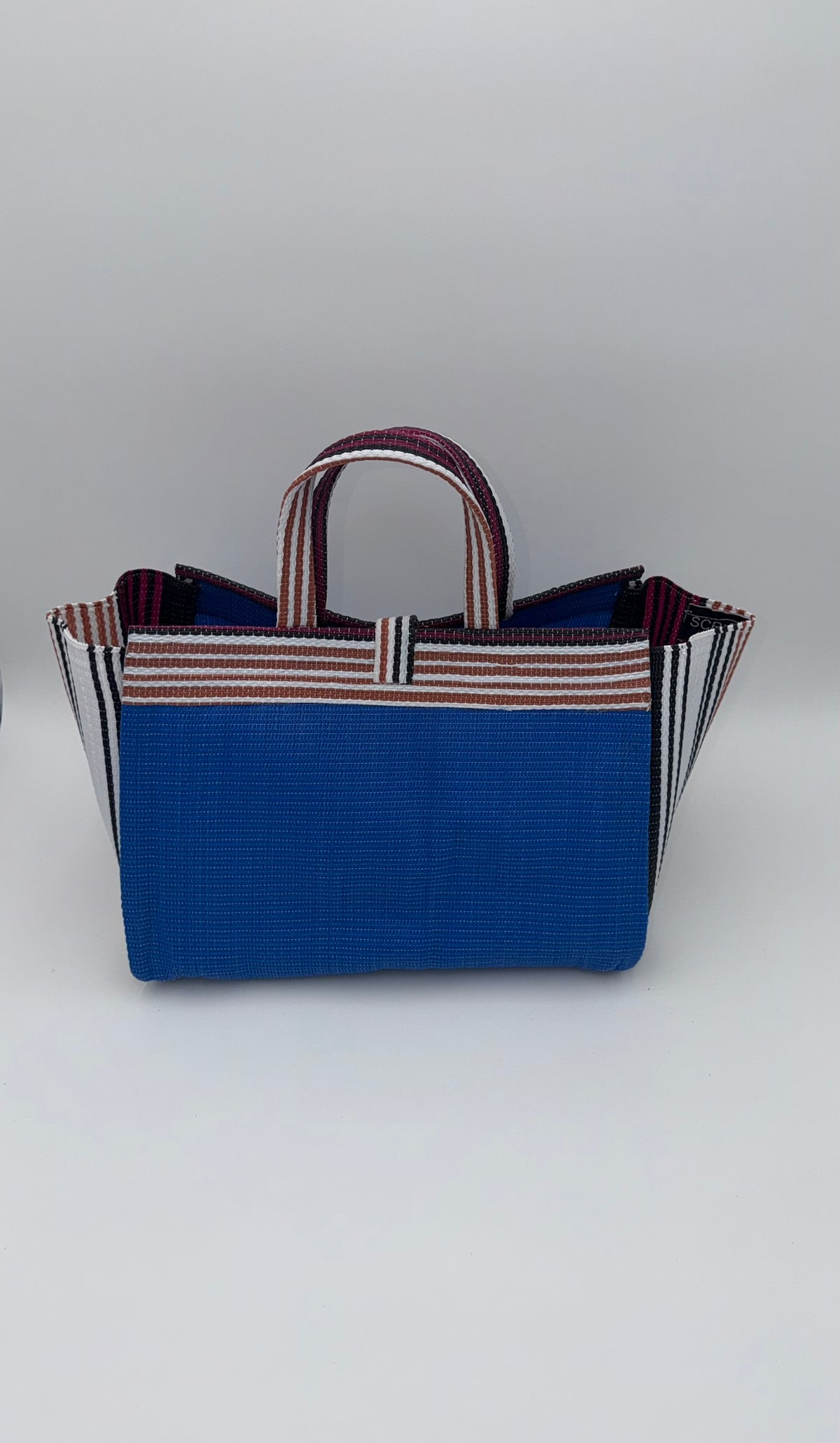 Lagoon Large handwoven tote bag by SCRUBIES in Blue,White,Wine with Solid design and Bow accent pattern