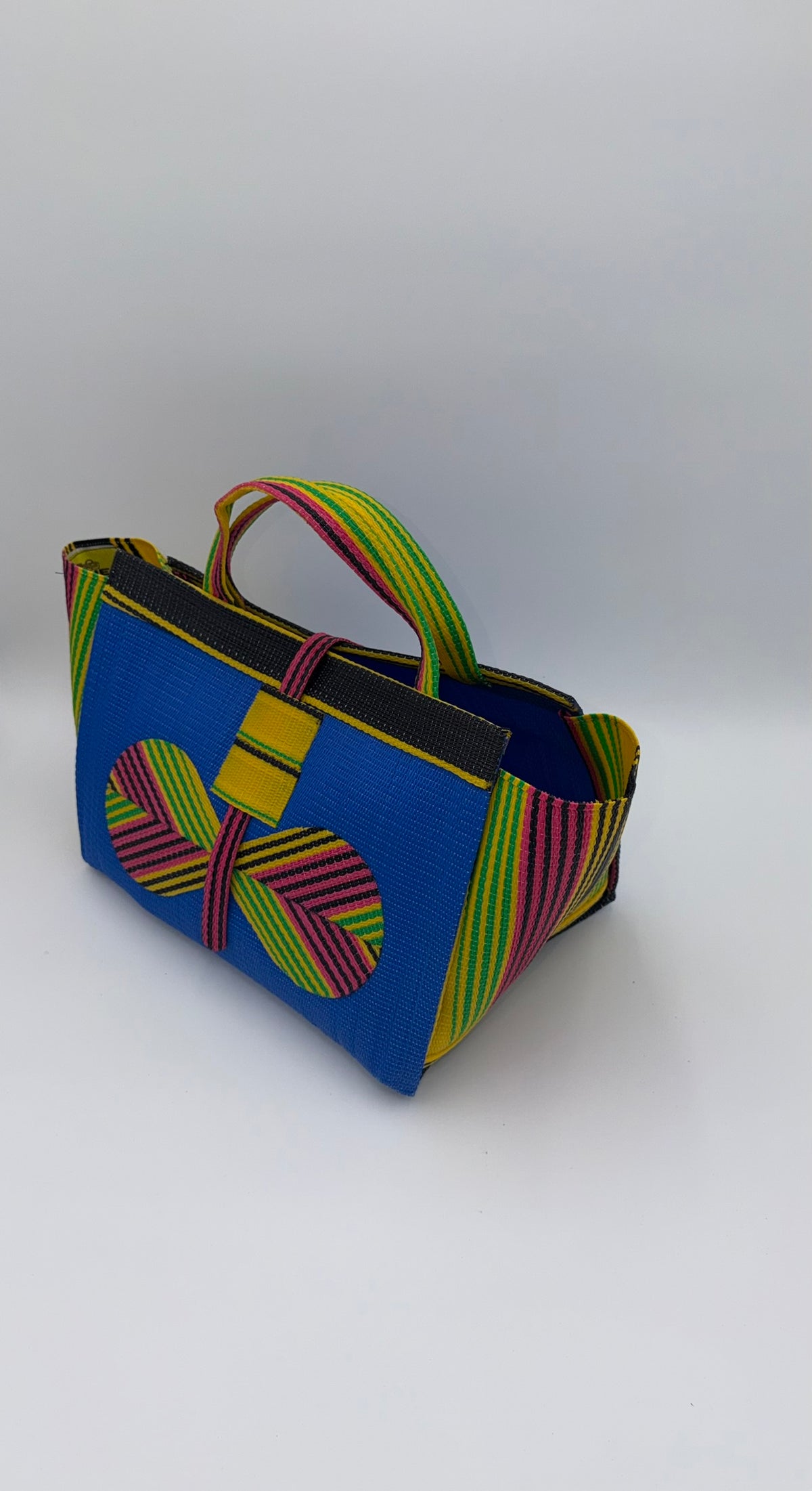 Lagoon Large handwoven tote bag by SCRUBIES in Blue,Yellow,Green,Pink with Solid design and Bow accent pattern