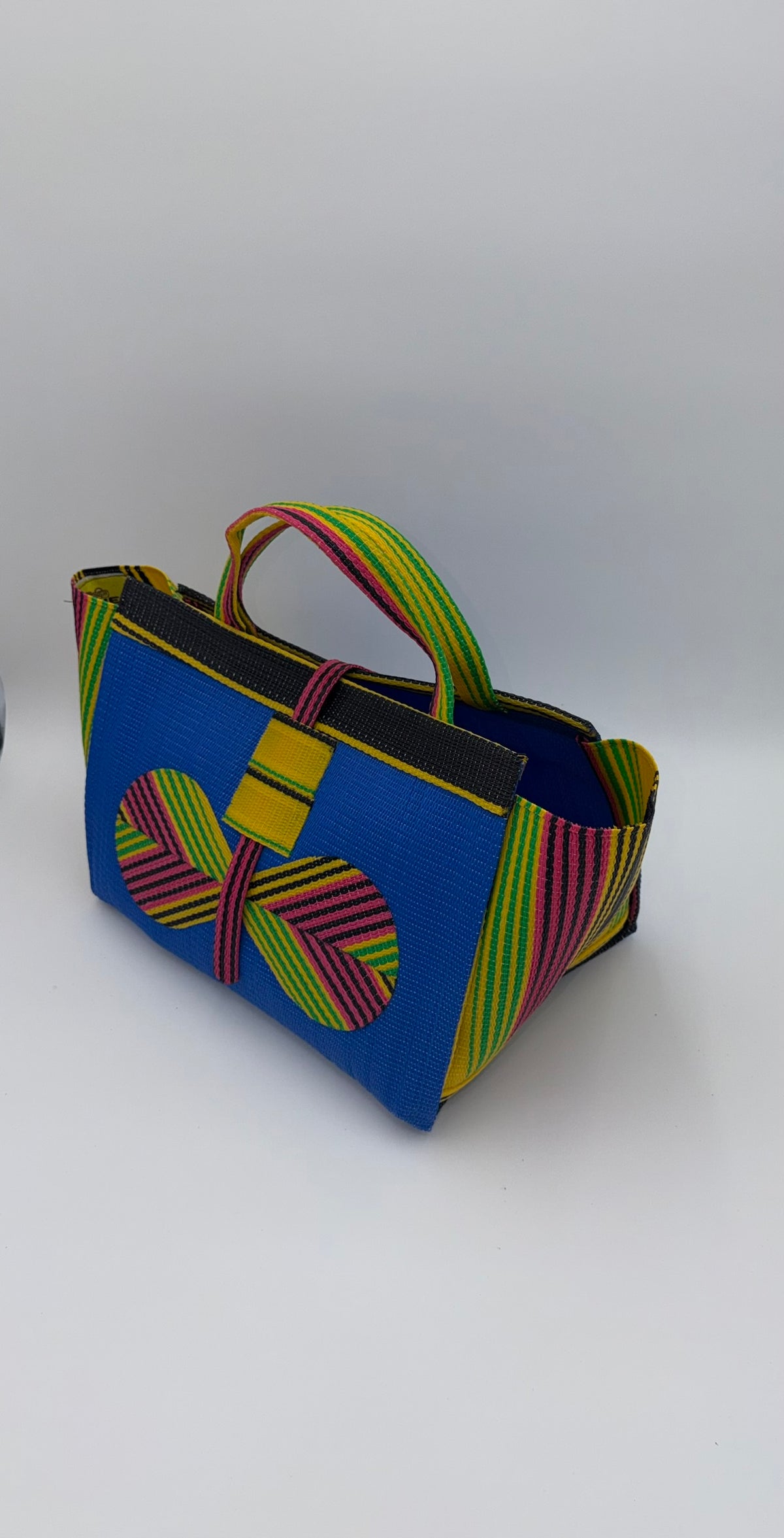 Lagoon Large handwoven tote bag by SCRUBIES in Blue,Yellow,Green,Pink with Solid design and Bow accent pattern