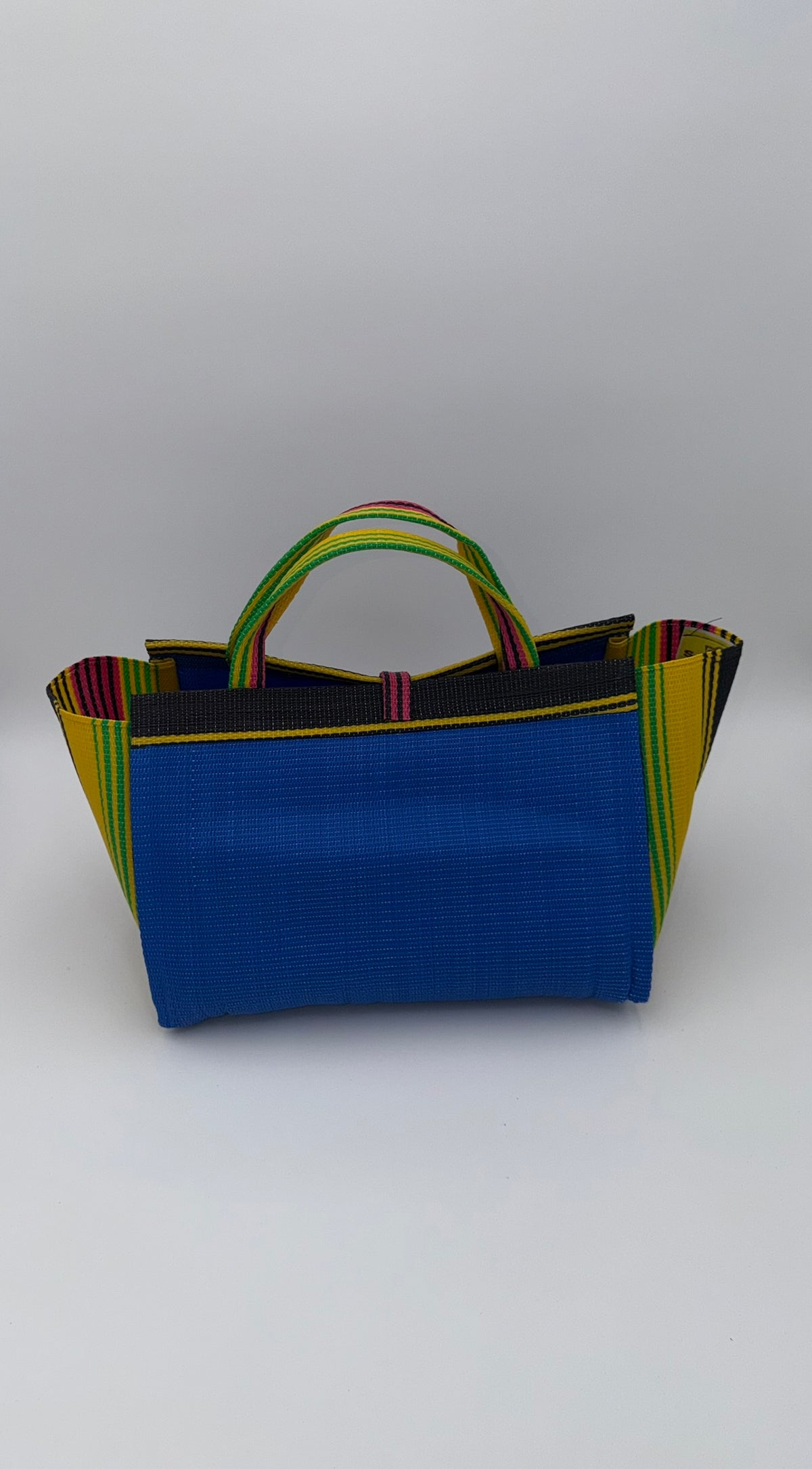 Lagoon Large handwoven tote bag by SCRUBIES in Blue,Yellow,Green,Pink with Solid design and Bow accent pattern