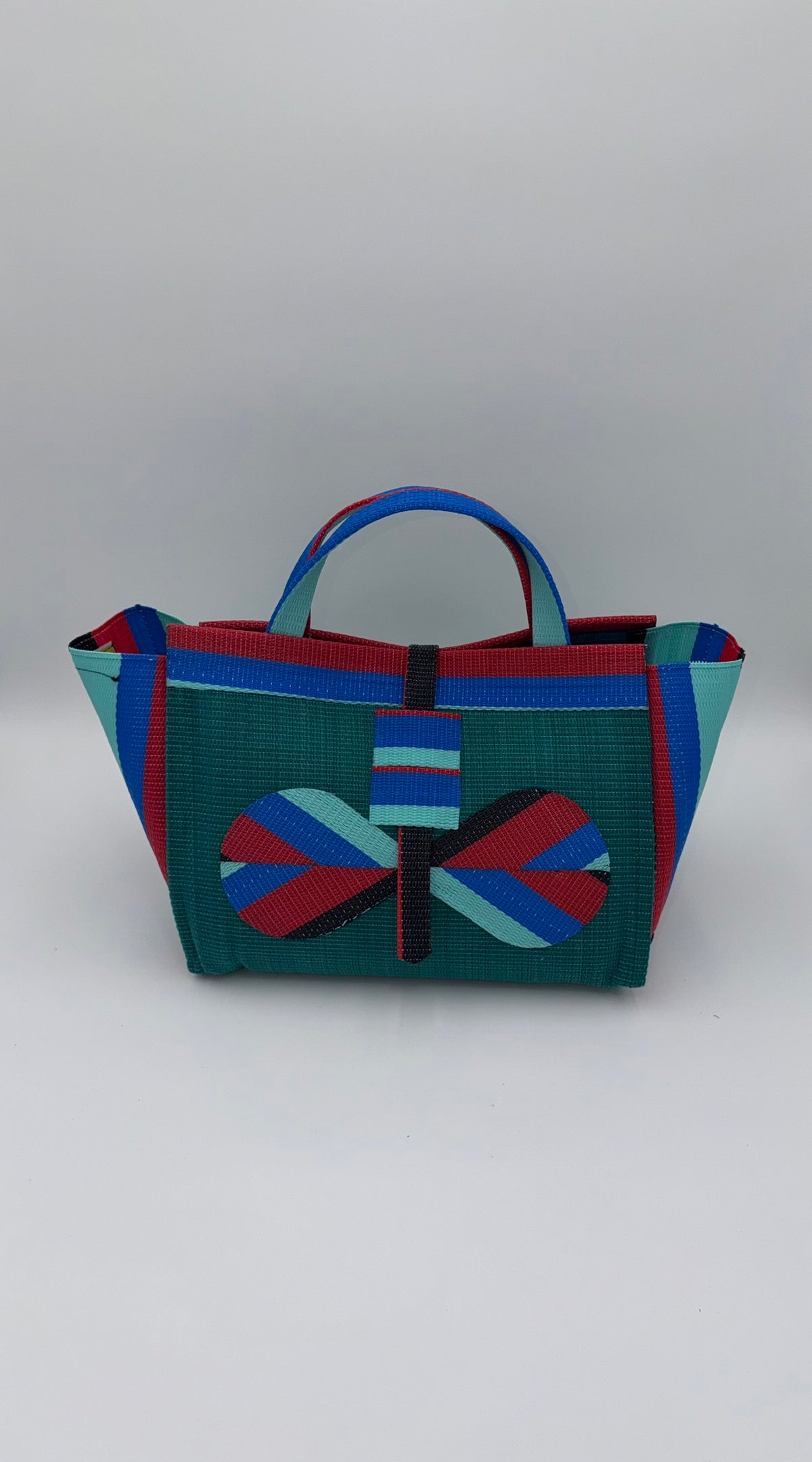 Emerald Large handwoven tote bag by SCRUBIES in Green,Red,Blue,Teal with Solid design and Bow accent pattern