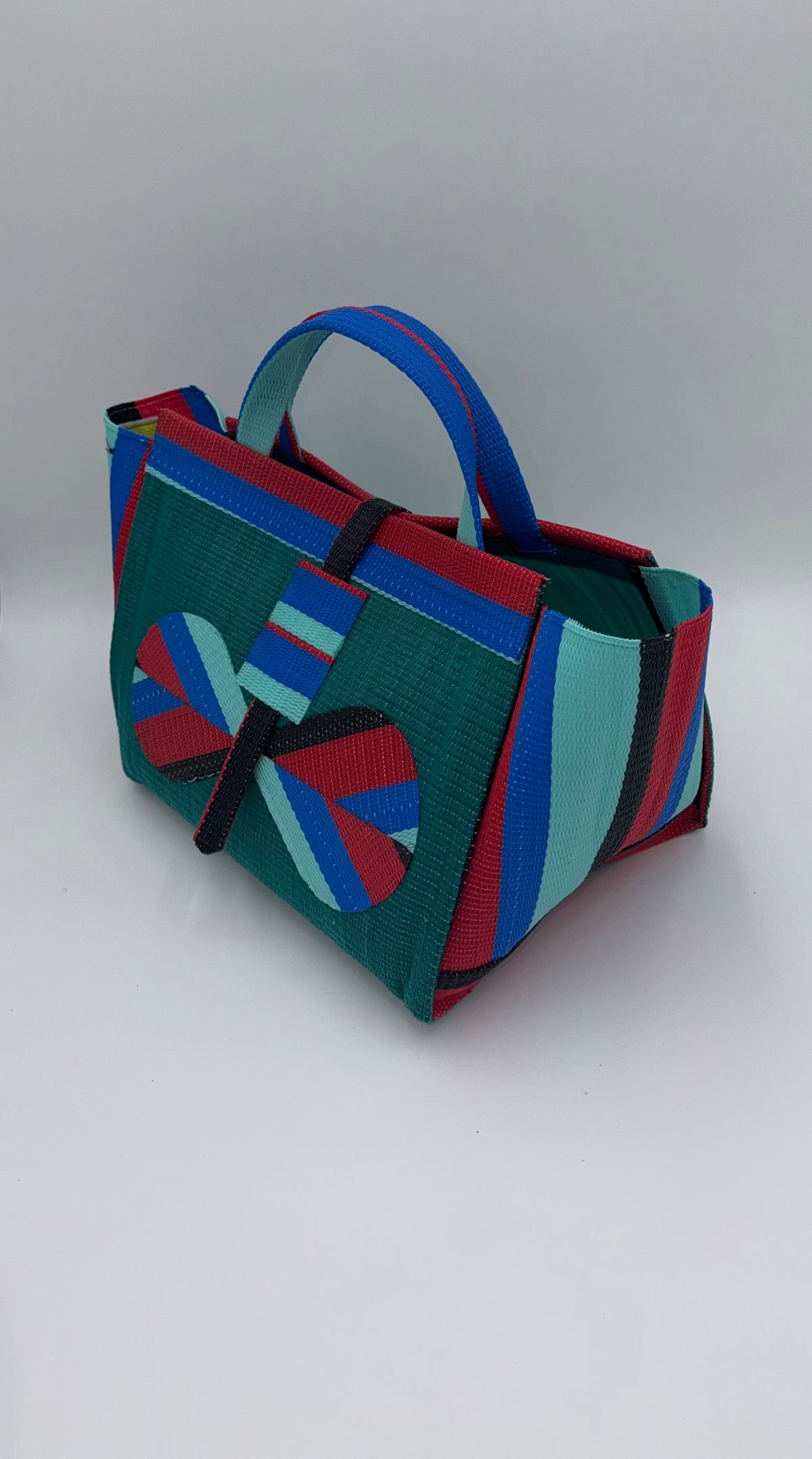 Emerald Large handwoven tote bag by SCRUBIES in Green,Red,Blue,Teal with Solid design and Bow accent pattern