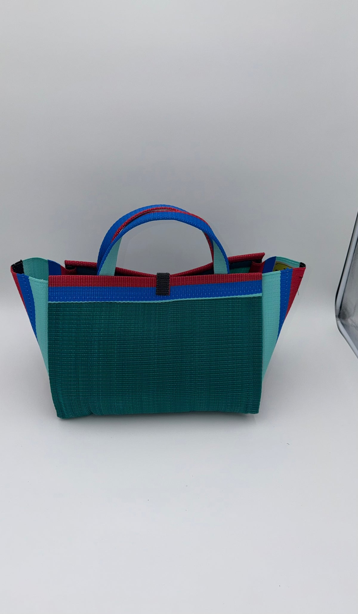Emerald Large handwoven tote bag by SCRUBIES in Green,Red,Blue,Teal with Solid design and Bow accent pattern