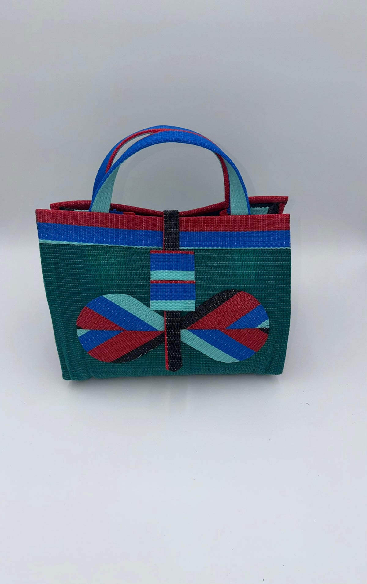 Emerald Large handwoven tote bag by SCRUBIES in Green,Red,Blue,Teal with Solid design and Bow accent pattern