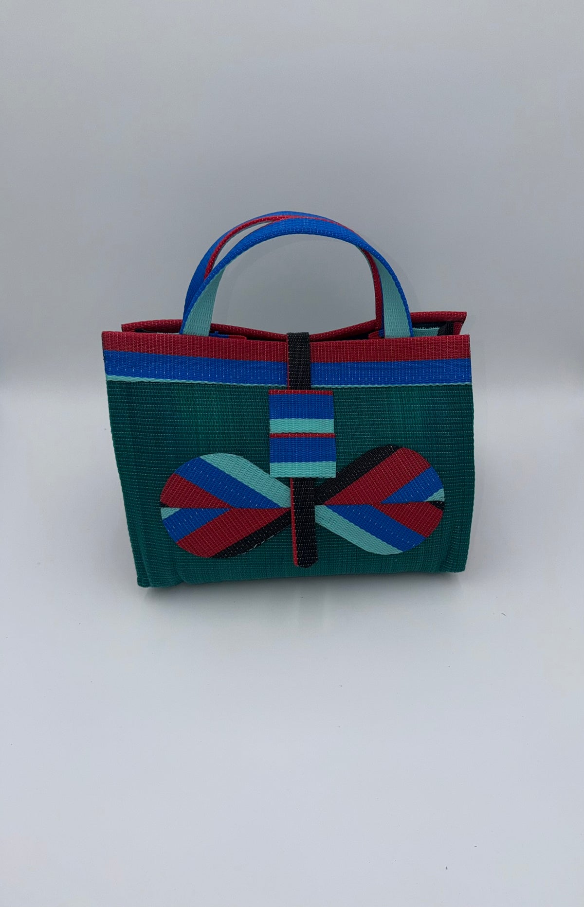 Emerald Large handwoven tote bag by SCRUBIES in Green,Red,Blue,Teal with Solid design and Bow accent pattern
