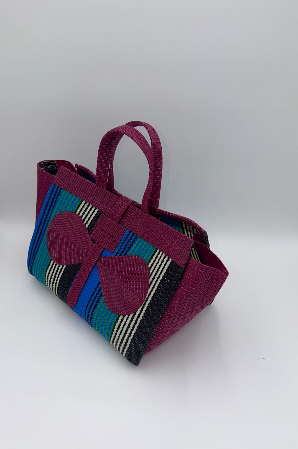 Emerald Large handwoven tote bag by SCRUBIES in Green,Red,Blue,Teal with Solid design and Bow accent pattern