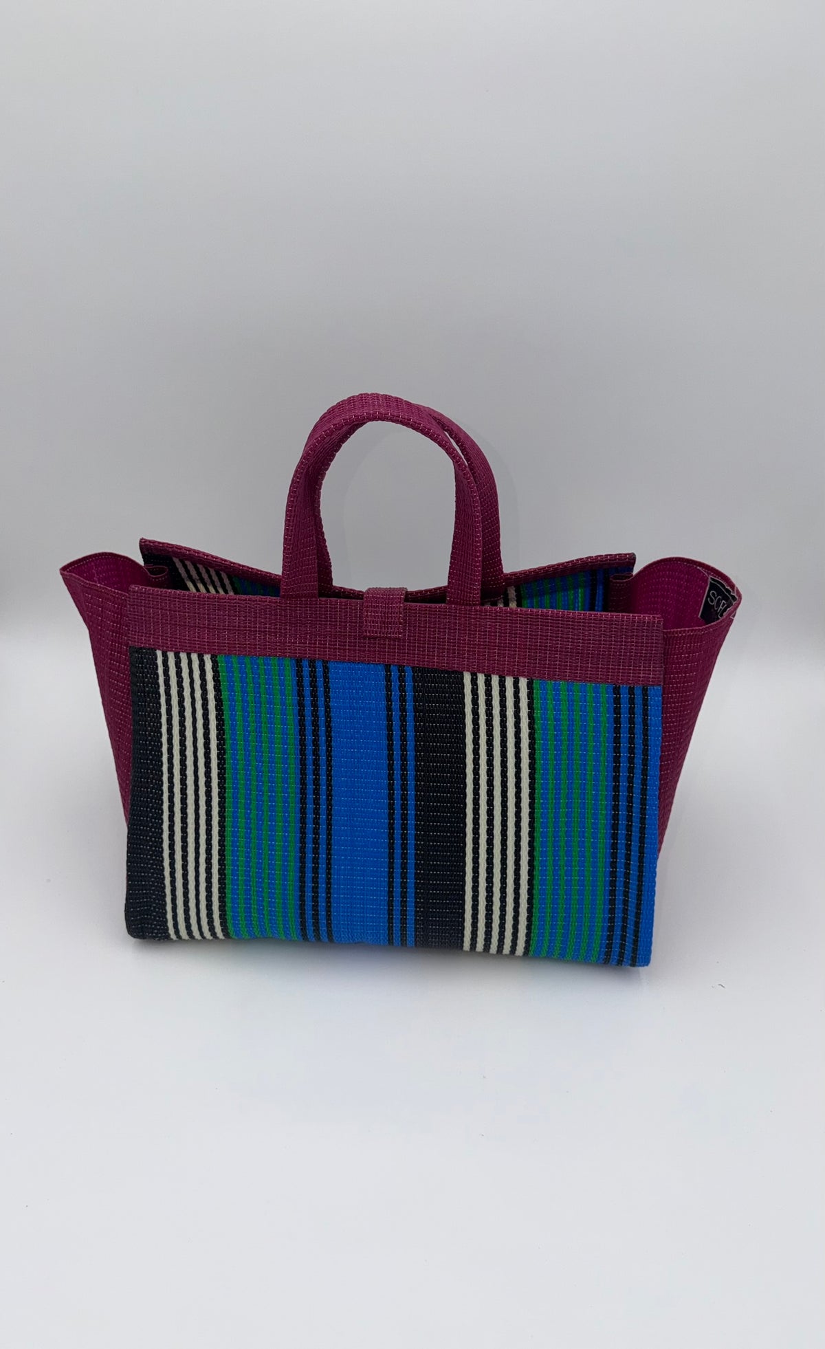 Emerald Large handwoven tote bag by SCRUBIES in Green,Red,Blue,Teal with Solid design and Bow accent pattern