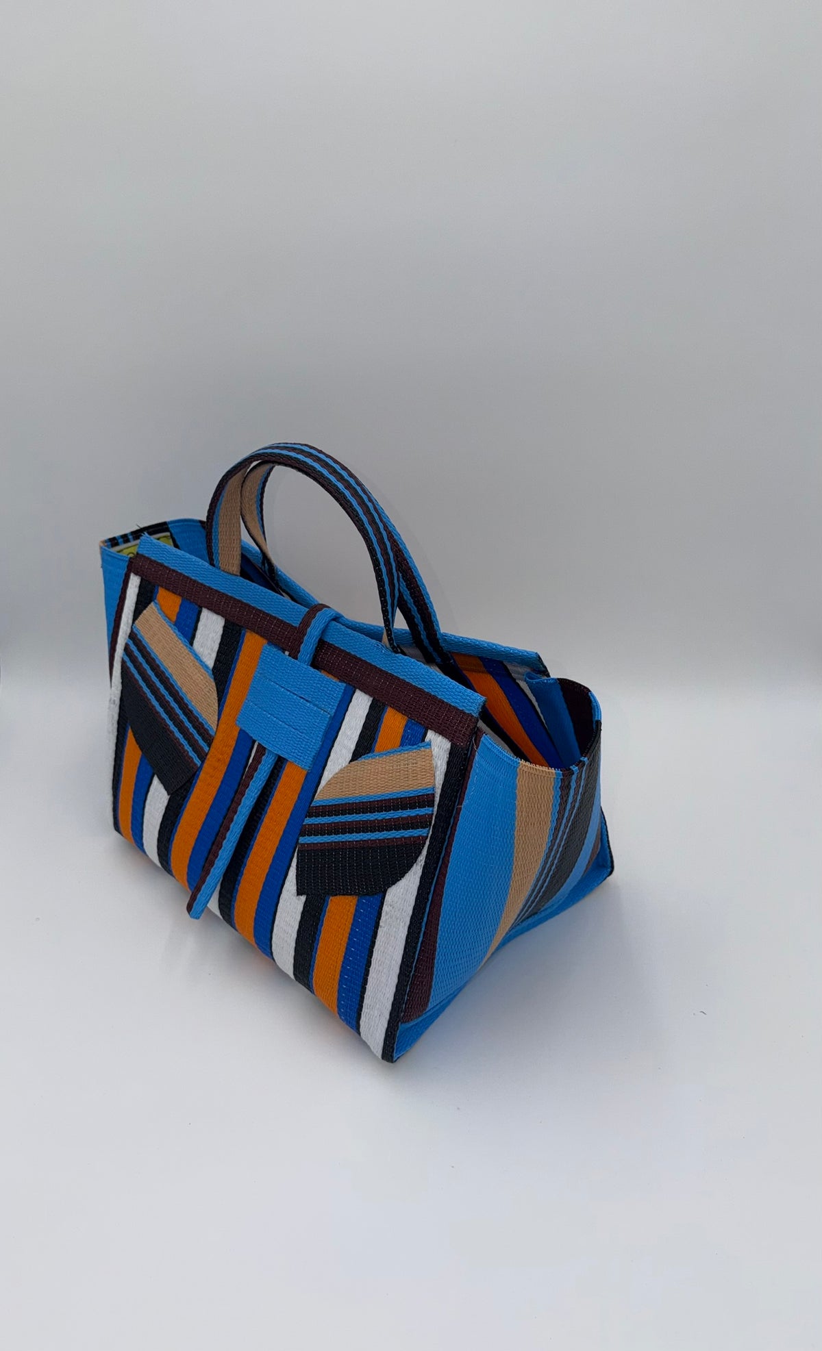 Sunshine Large handwoven tote bag by SCRUBIES in Blue,White,Orange,Black with Stripes design and Leaf accent pattern