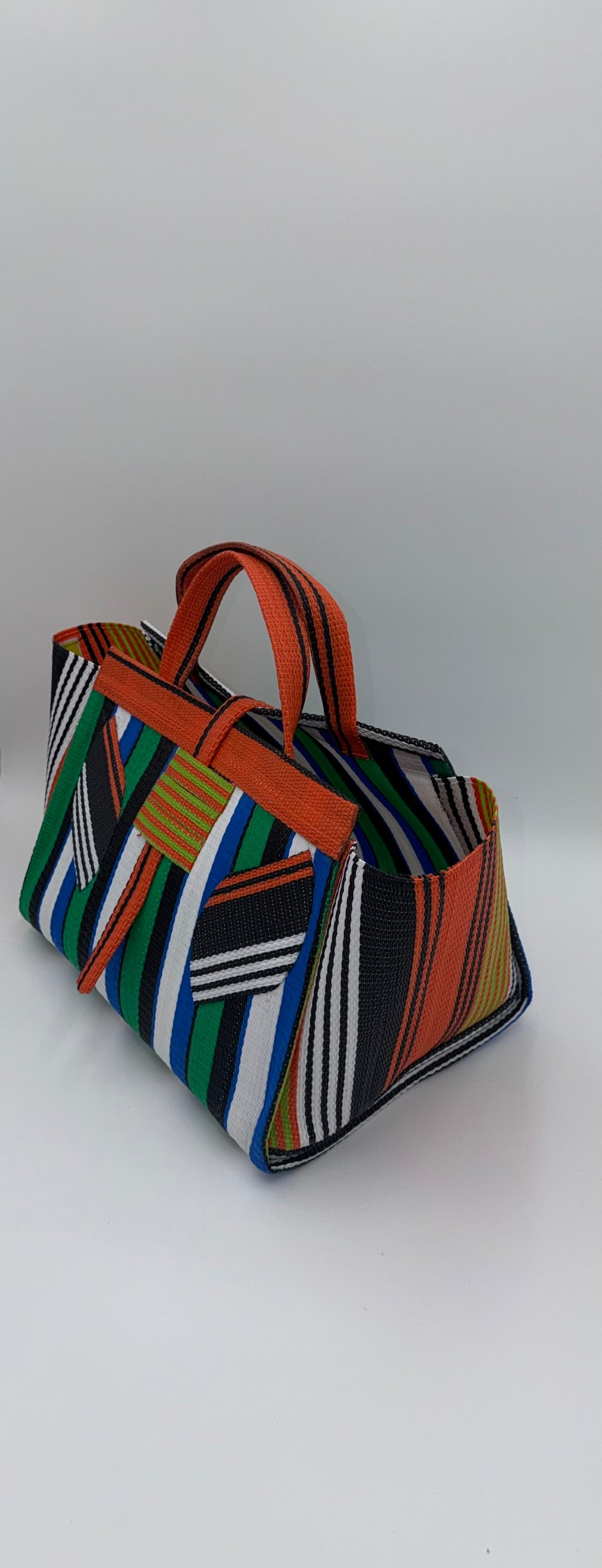 Emerald Large handwoven tote bag by SCRUBIES in Orange,Green,White,Blue,Black with Stripes design and Leaf accent pattern