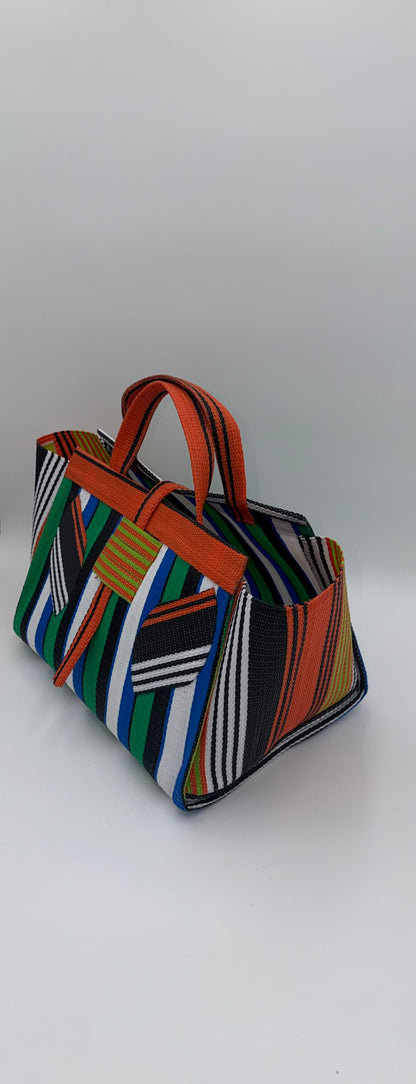 Emerald Large handwoven tote bag by SCRUBIES in Orange,Green,White,Blue,Black with Stripes design and Leaf accent pattern