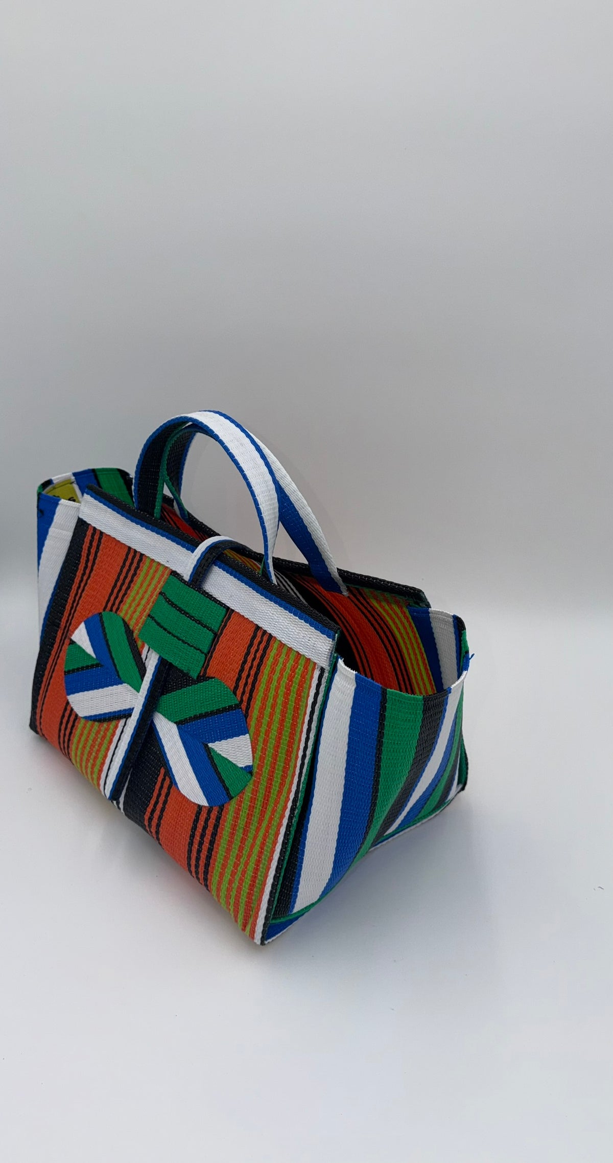 Citrus Large handwoven tote bag by SCRUBIES in Orange,White,Green,Blue with Stripes design and Bow accent pattern