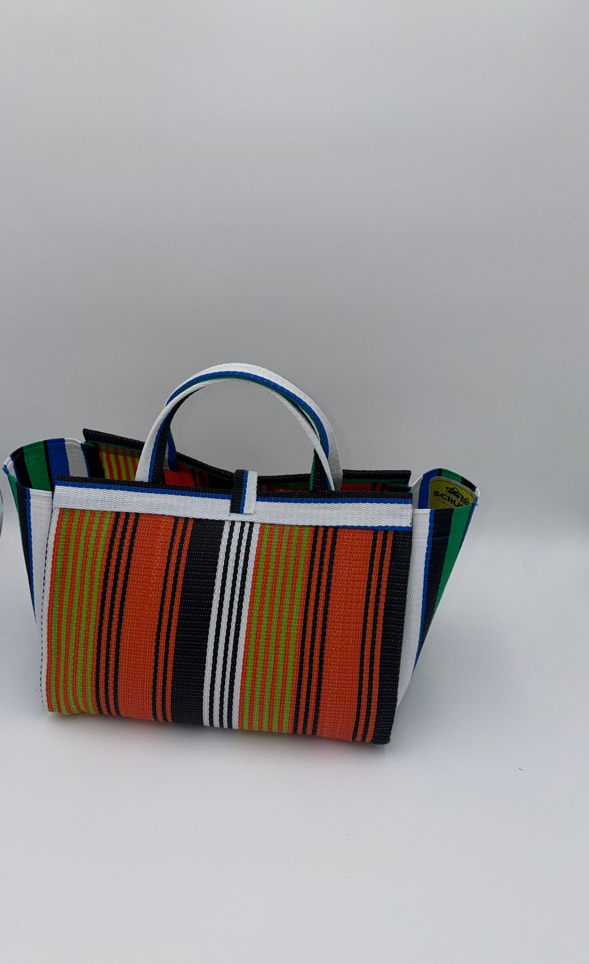 Citrus Large handwoven tote bag by SCRUBIES in Orange,White,Green,Blue with Stripes design and Bow accent pattern