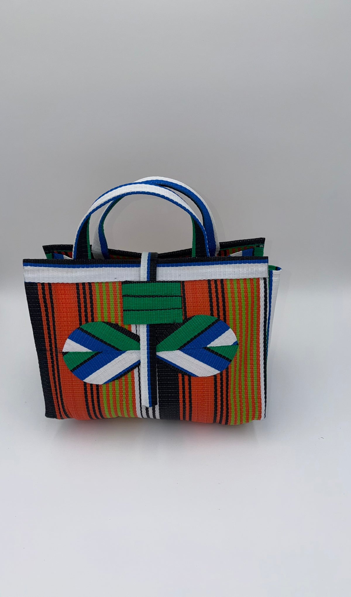 Citrus Large handwoven tote bag by SCRUBIES in Orange,White,Green,Blue with Stripes design and Bow accent pattern