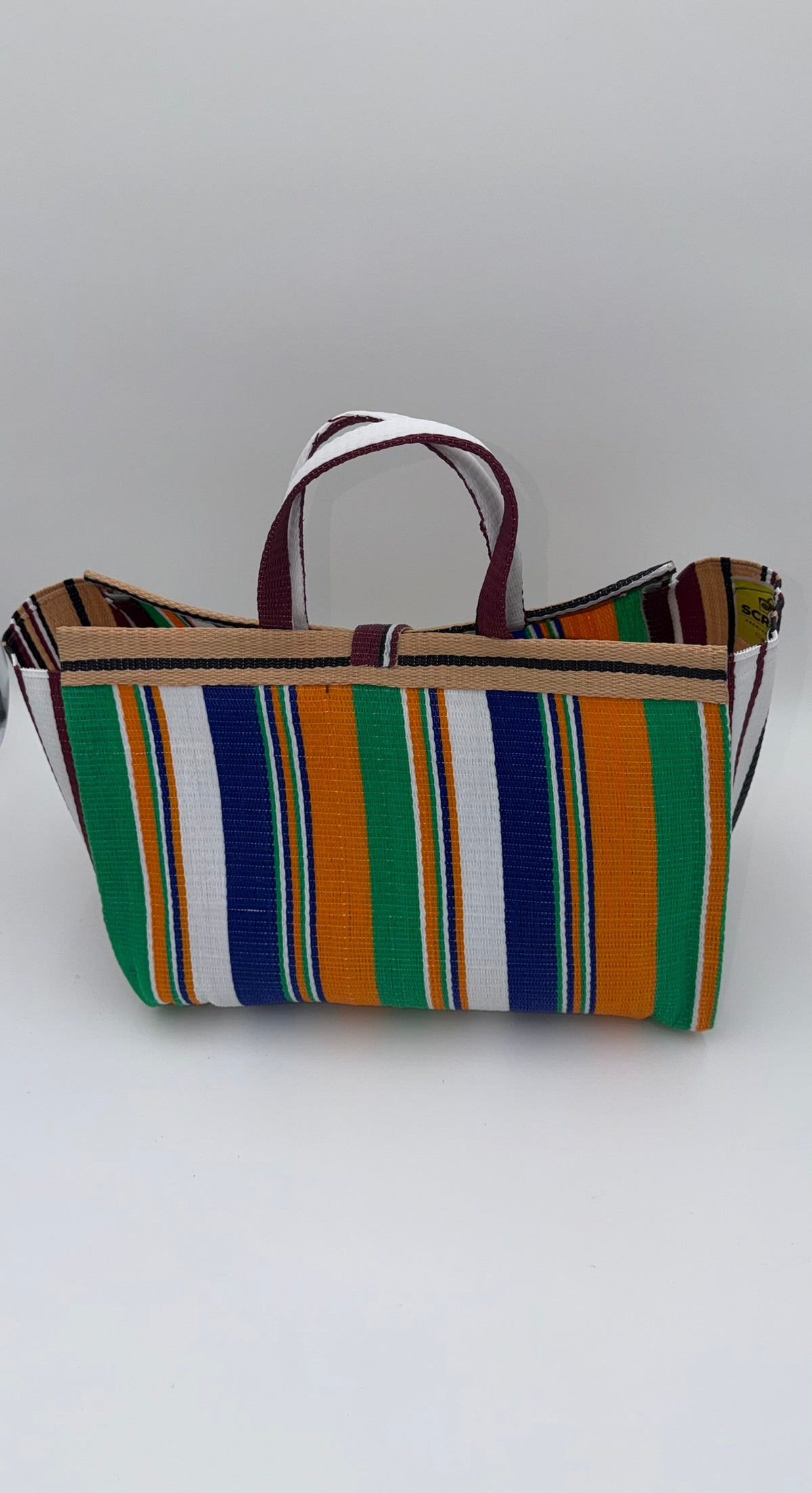 Citrus Large handwoven tote bag by SCRUBIES in Orange,Green,White,Beige with Stripes design and Bow accent pattern
