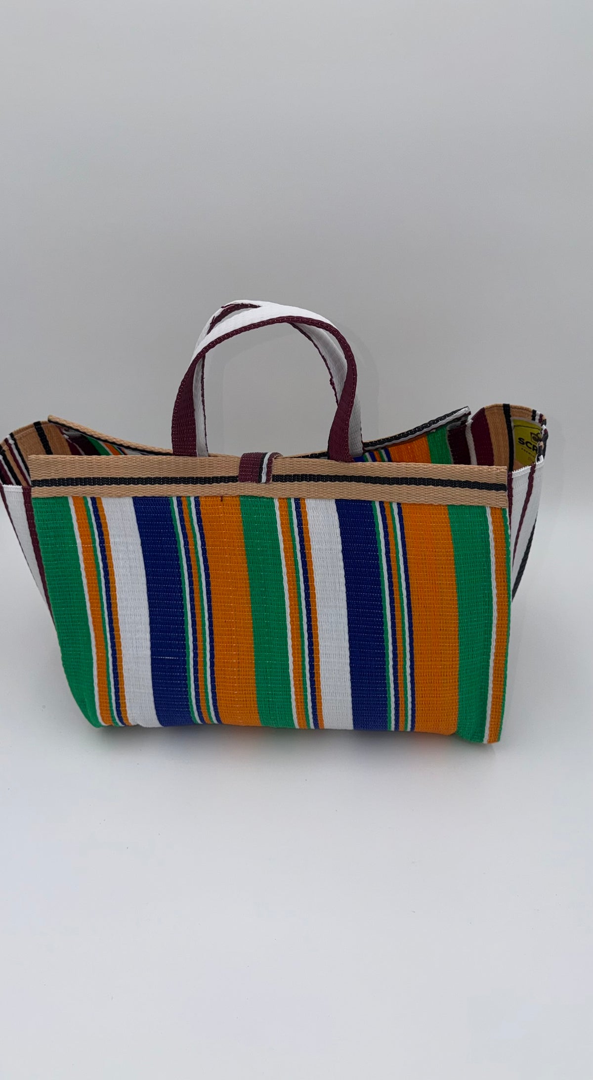 Citrus Large handwoven tote bag by SCRUBIES in Orange,Green,White,Beige with Stripes design and Bow accent pattern