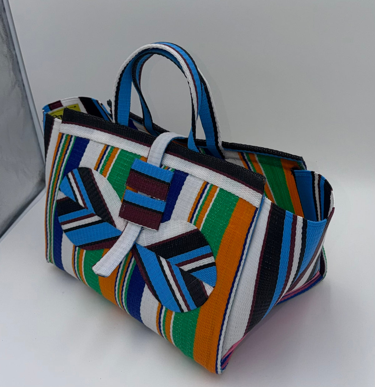 Citrus Large handwoven tote bag by SCRUBIES in Orange,Blue,White,Green, with Stripes design and Bow accent pattern