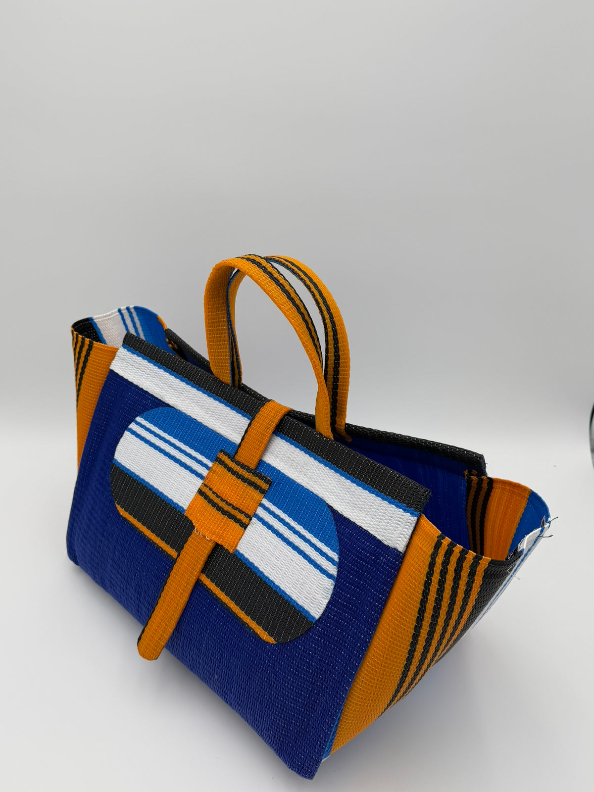 Berry Large handwoven tote bag by SCRUBIES in Blue,White,Orange,Black with Solid design and Oval accent pattern