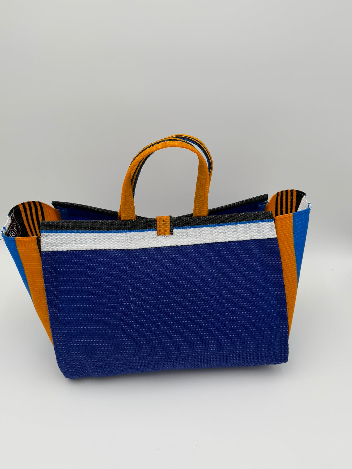 Berry Large handwoven tote bag by SCRUBIES in Blue,White,Orange,Black with Solid design and Oval accent pattern