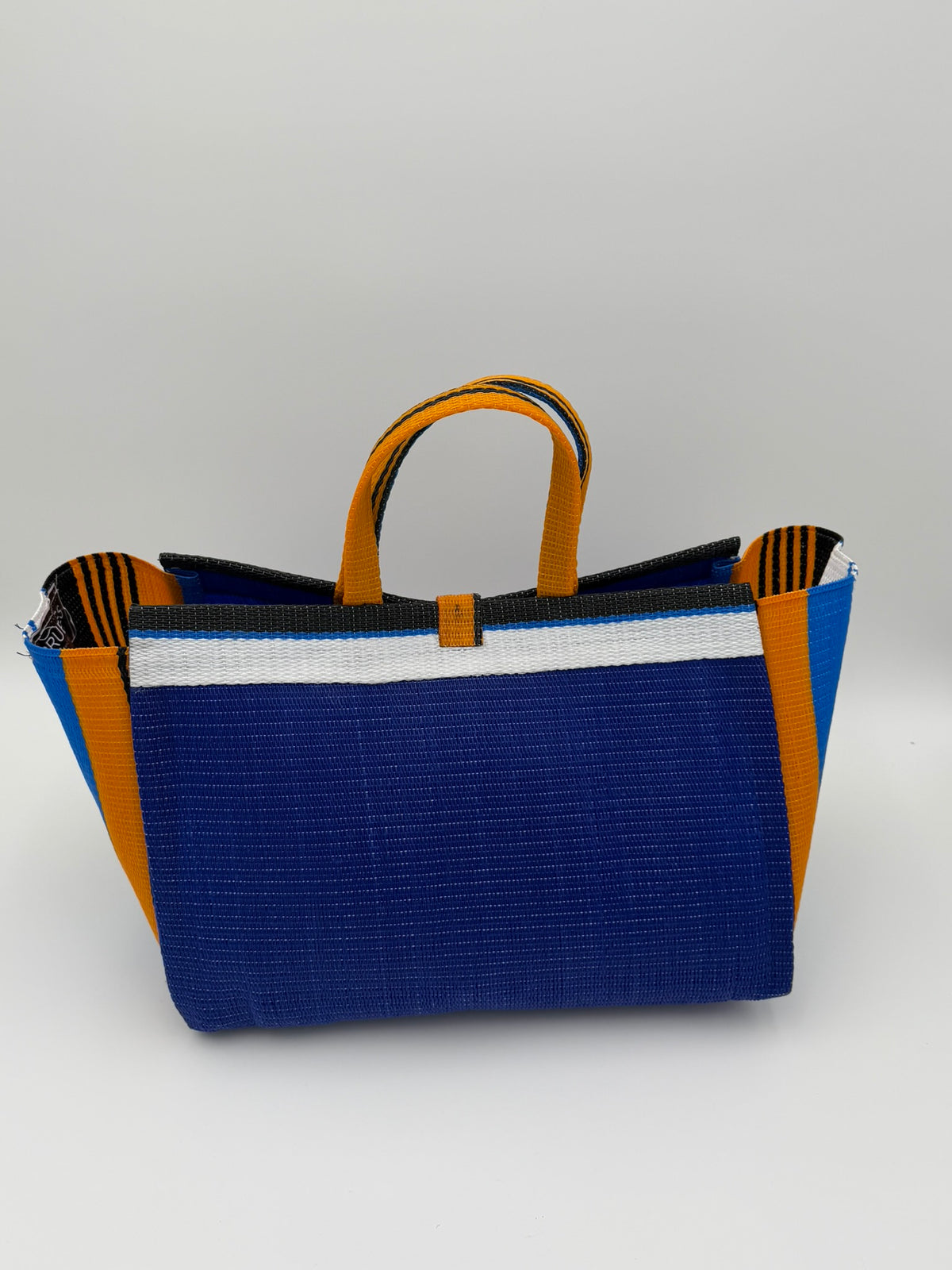 Berry Large handwoven tote bag by SCRUBIES in Blue,White,Orange,Black with Solid design and Oval accent pattern