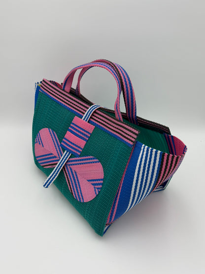 Candy Large handwoven tote bag by SCRUBIES in Green,Pink with Solid design and Bow accent pattern