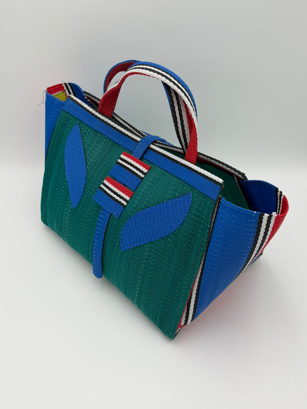 Emerald Large handwoven tote bag by SCRUBIES in Green,Blue,Red with Solid design and Leaf accent pattern