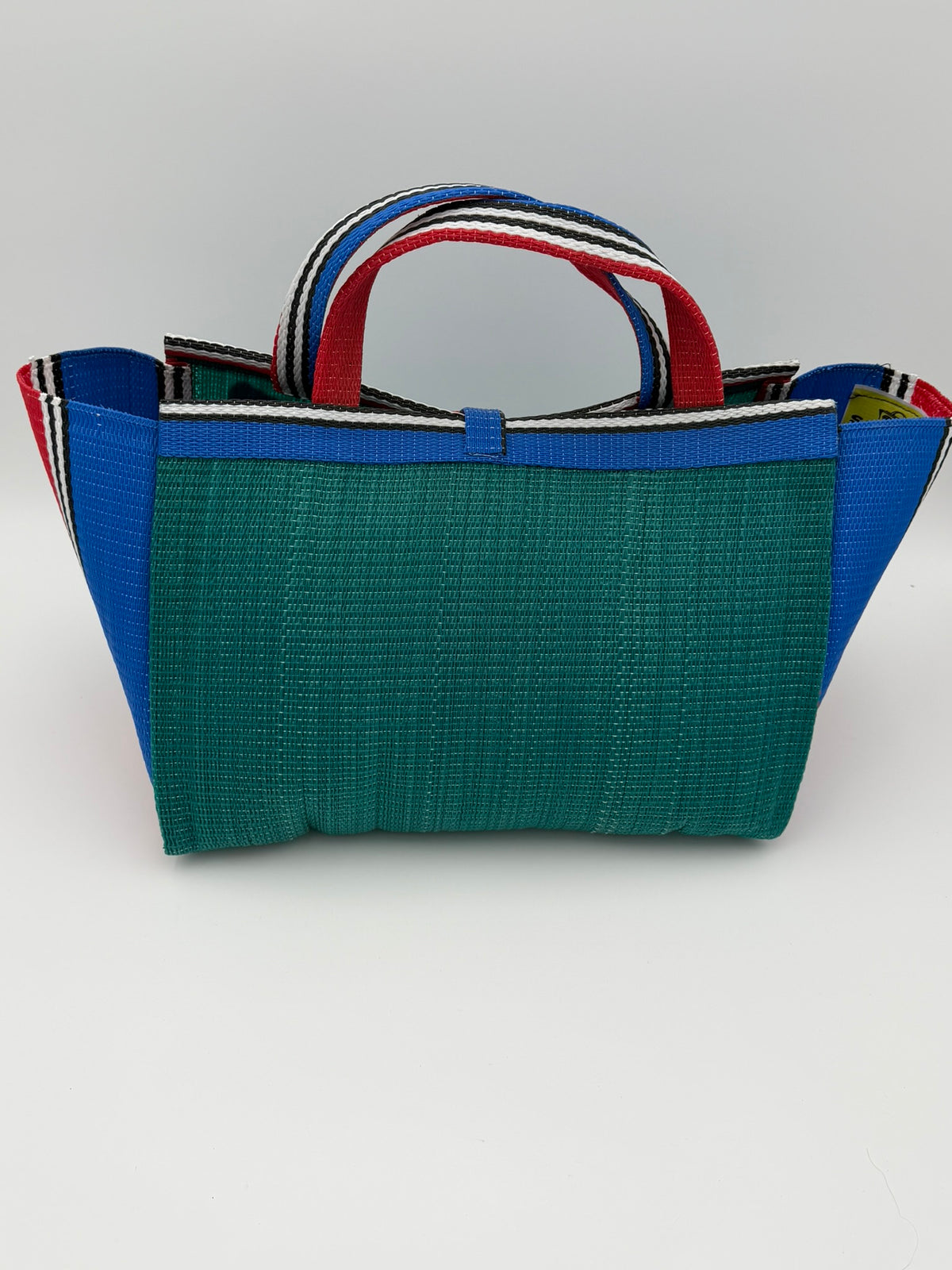Emerald Large handwoven tote bag by SCRUBIES in Green,Blue,Red with Solid design and Leaf accent pattern
