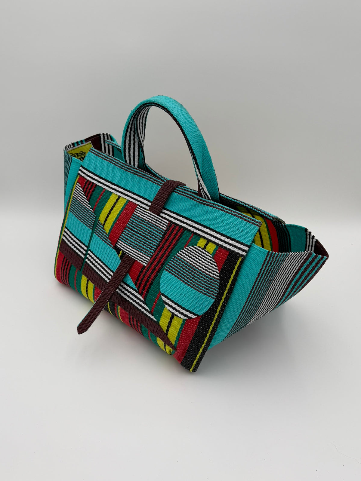 Africana Large handwoven tote bag by SCRUBIES in Red,Black,Blue,White,Yellow,Teal with Stripes design and Abstract accent pattern