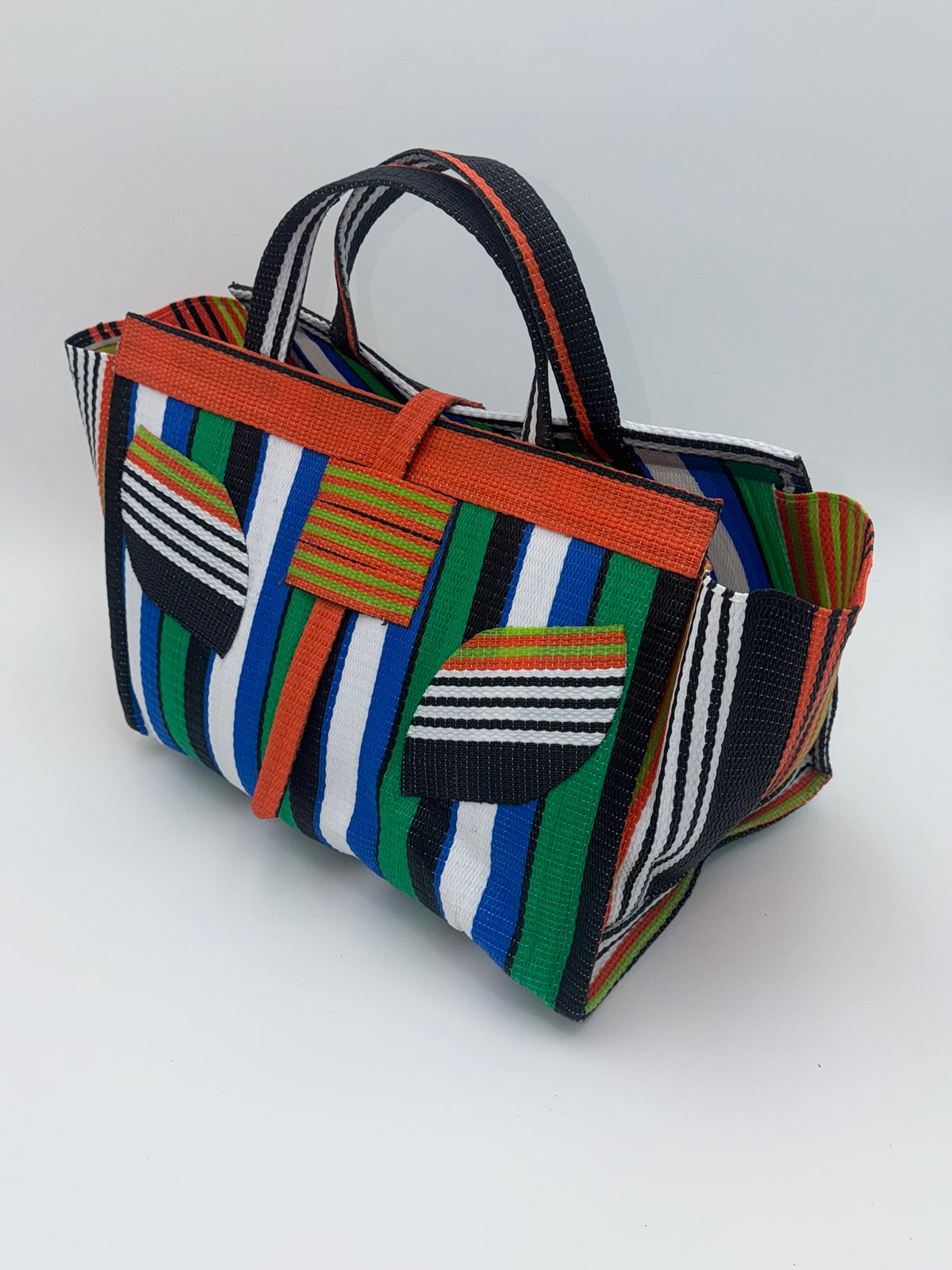 Emerald Large handwoven tote bag by SCRUBIES in Orange,White,Green,Blue with Stripes design and Leaf accent pattern