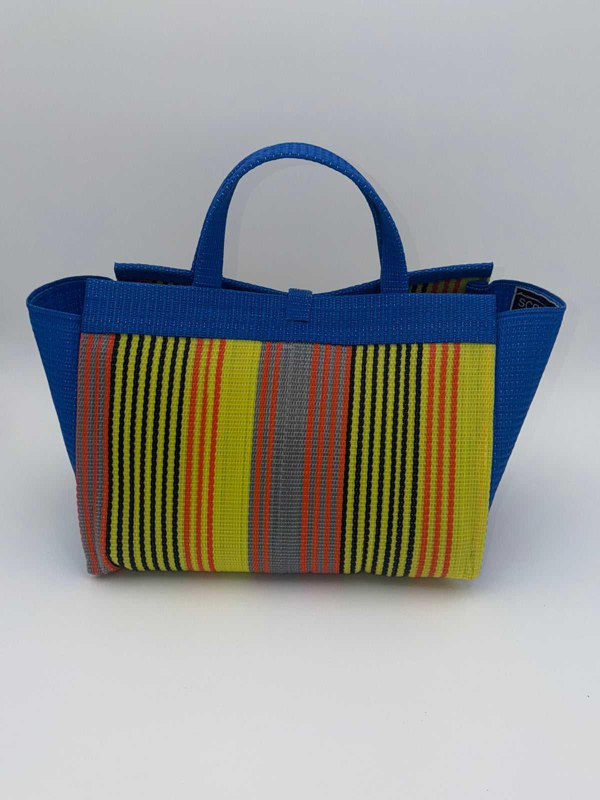Citrus Large handwoven tote bag by SCRUBIES in Blue,Yellow,Orange with Stripes design and Leaf accent pattern