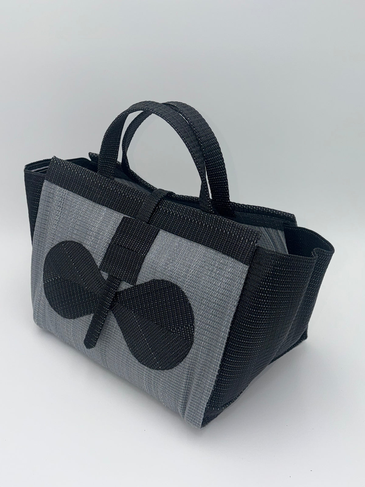 Silver Large handwoven tote bag by SCRUBIES in Grey,Black with Solid design and Bow accent pattern