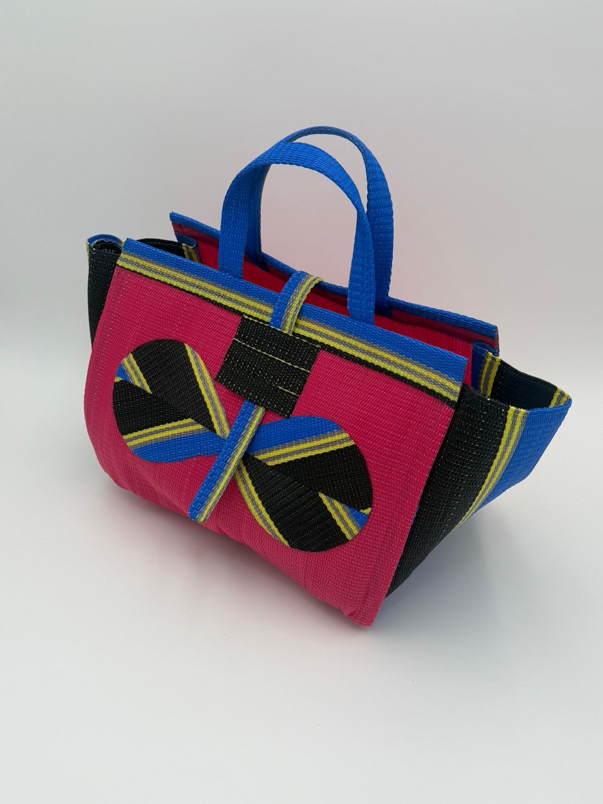 Candy Large handwoven tote bag by SCRUBIES in Pink,Black,Blue,Yellow with Solid design and Bow accent pattern