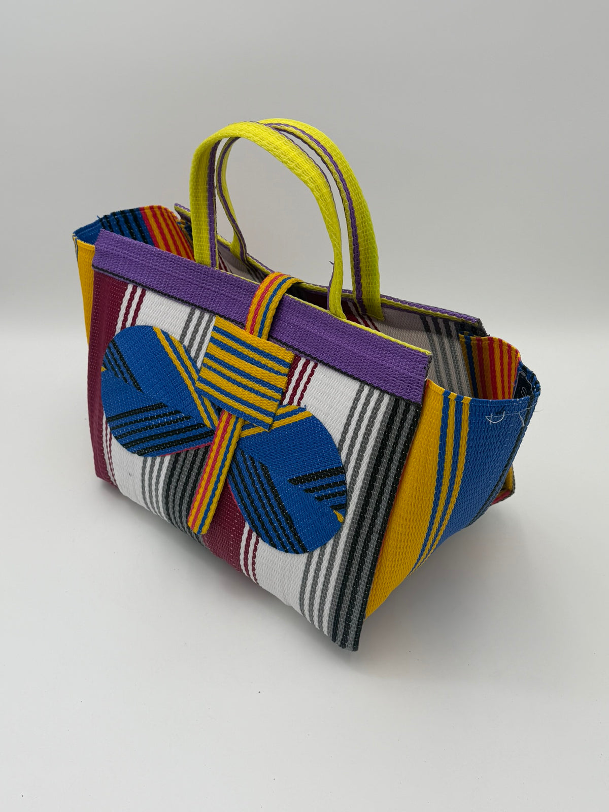 Pearl Large handwoven tote bag by SCRUBIES in Bluw,Wine,White,Purple,Yellow with Stripes design and Bow accent pattern