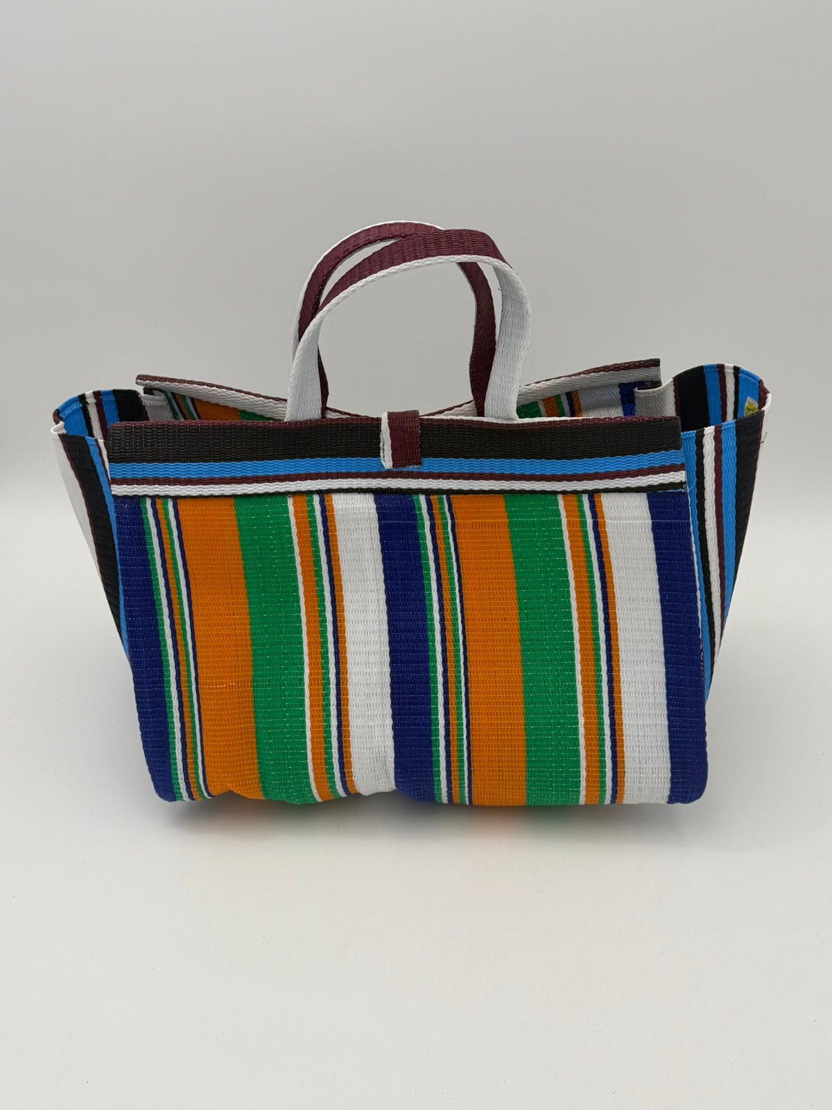 Citrus Large handwoven tote bag by SCRUBIES in Blue,White,Orange,Green with Stripes design and Bow accent pattern