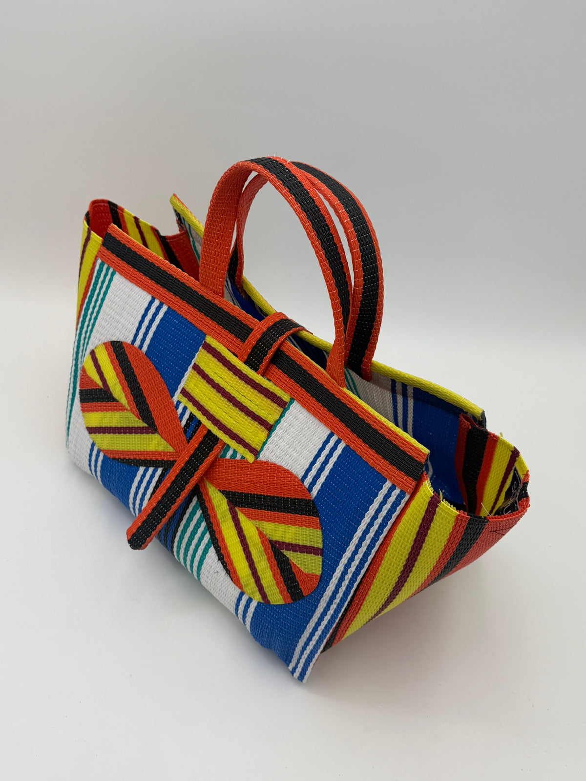 Sunshine Large handwoven tote bag by SCRUBIES in Orange,Yellow,Blue,White with Stripes design and Bow accent pattern