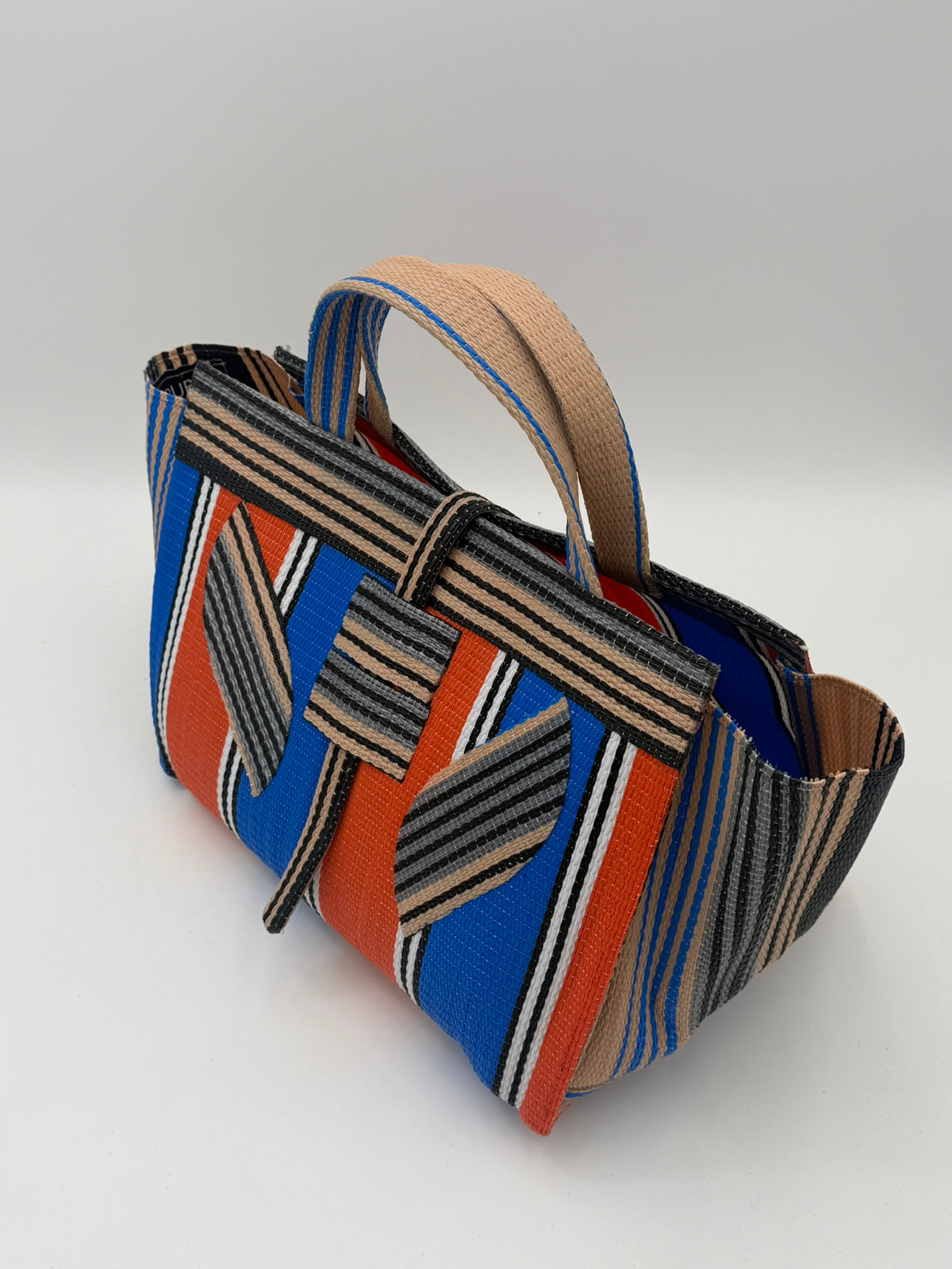 Citrus Large handwoven tote bag by SCRUBIES in Orange,Blue,Beige,Black with Stripes design and Leaf accent pattern