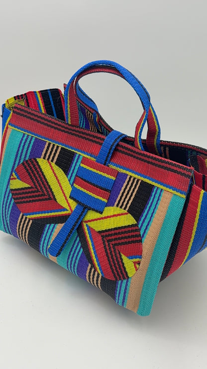 Africana Large handwoven tote bag by SCRUBIES in Red,Yellow,Teal,Purple,Beige,Black with Stripes design and Bow accent pattern
