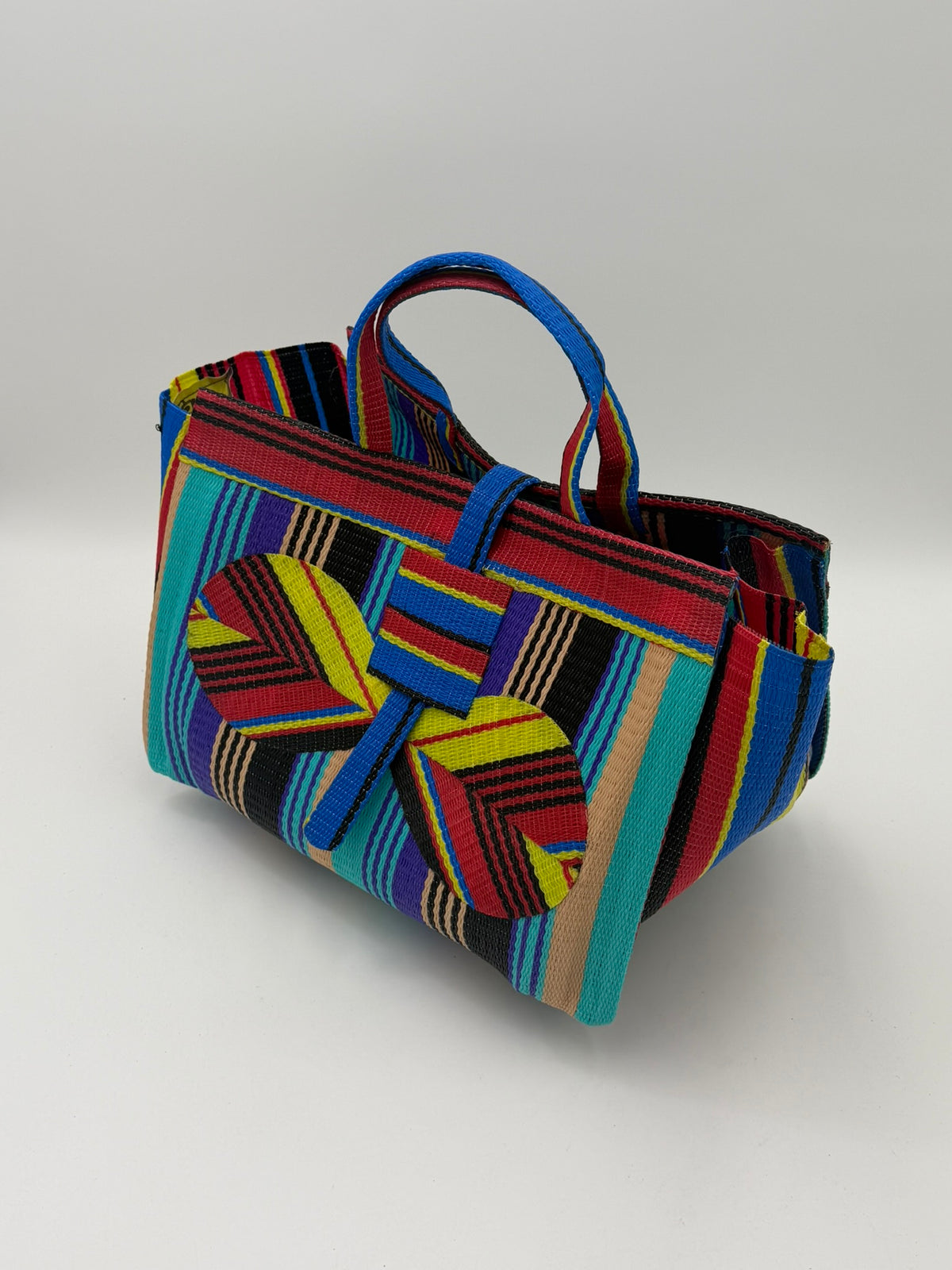 Africana Large handwoven tote bag by SCRUBIES in Red,Yellow,Teal,Purple,Beige,Black with Stripes design and Bow accent pattern