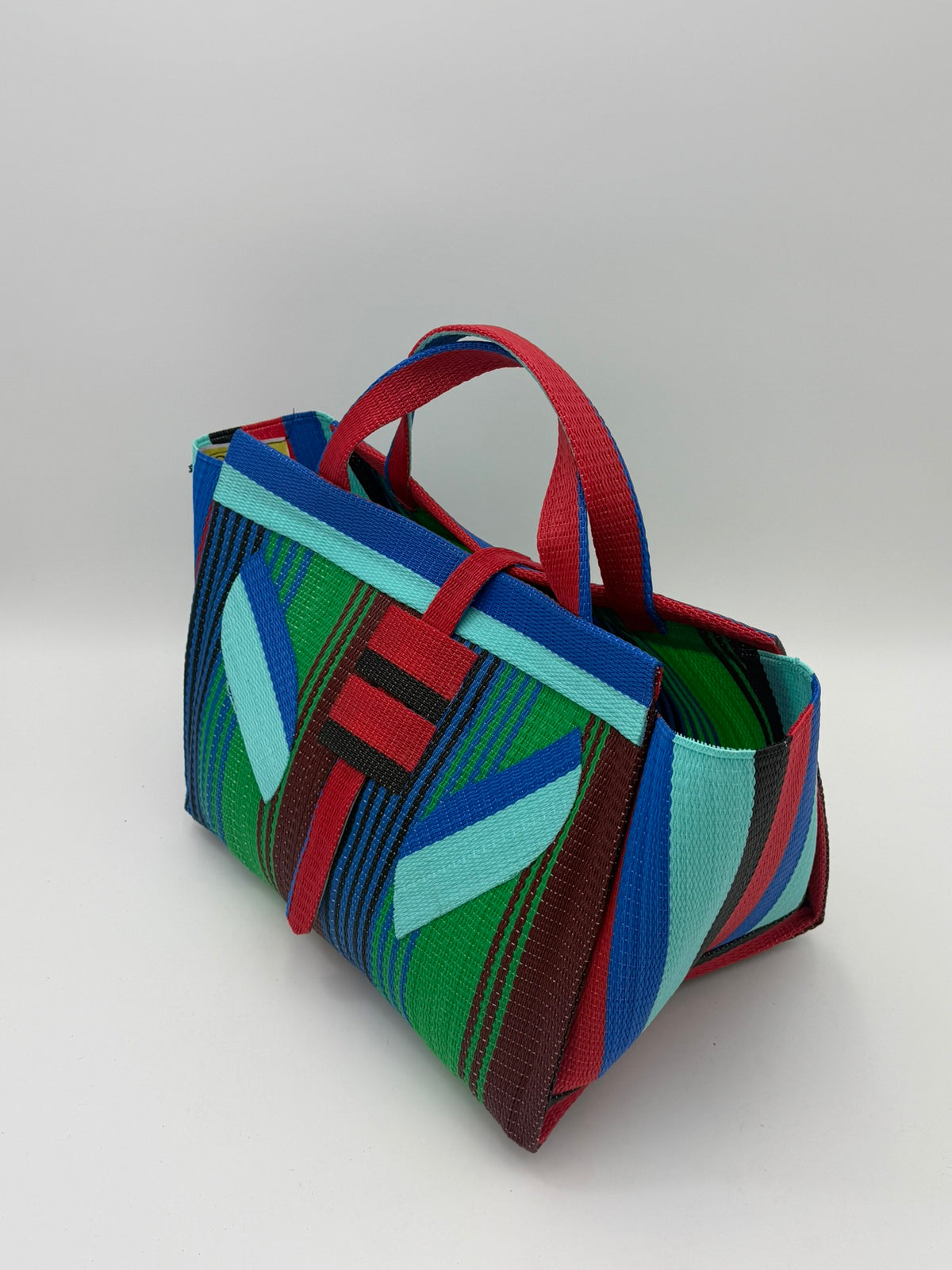 Emerald Large handwoven tote bag by SCRUBIES in Green,Red,Blue,Teal with Stripes design and Leaf accent pattern