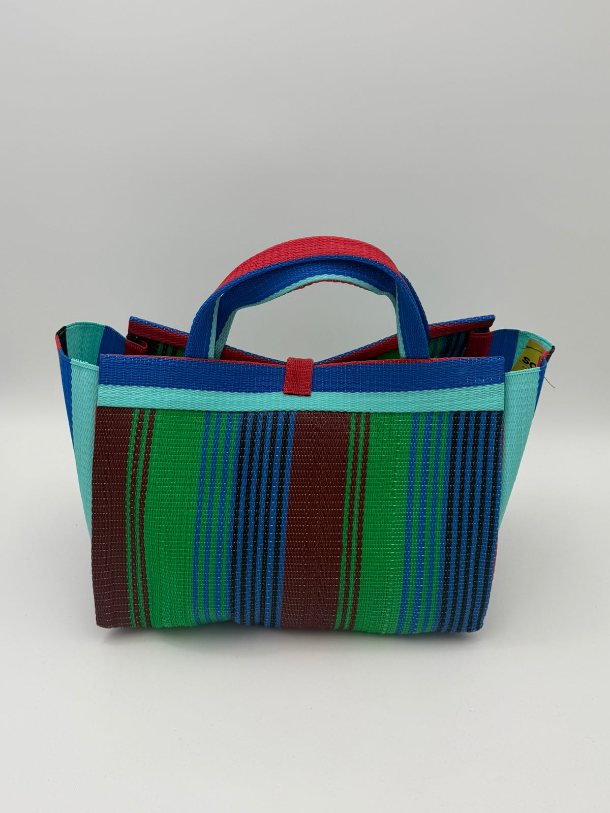 Emerald Large handwoven tote bag by SCRUBIES in Green,Red,Blue,Teal with Stripes design and Leaf accent pattern