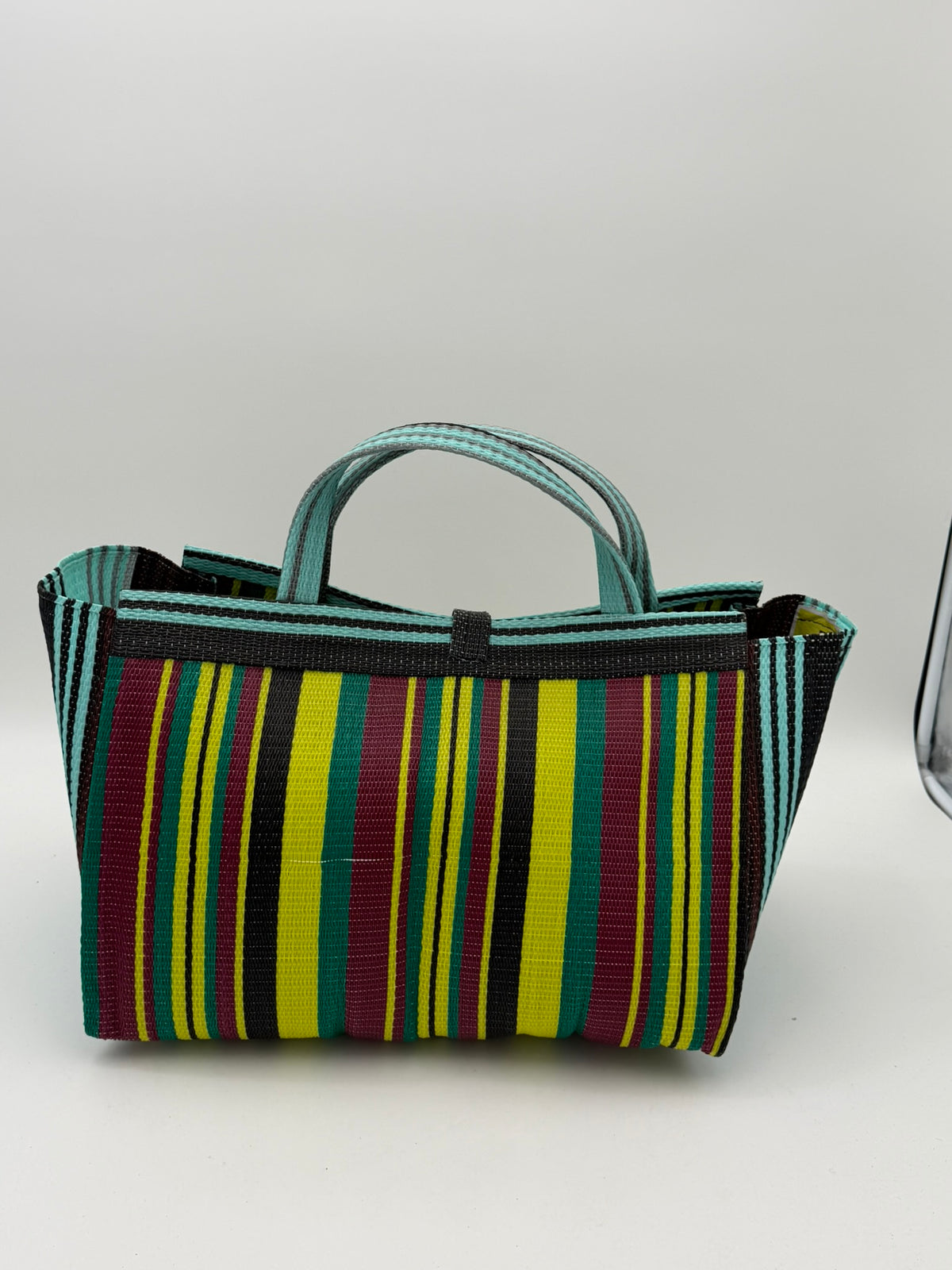 Carbon Large handwoven tote bag by SCRUBIES in Wine,Yellow,Teal,Brown with Stripes design and Bow accent pattern