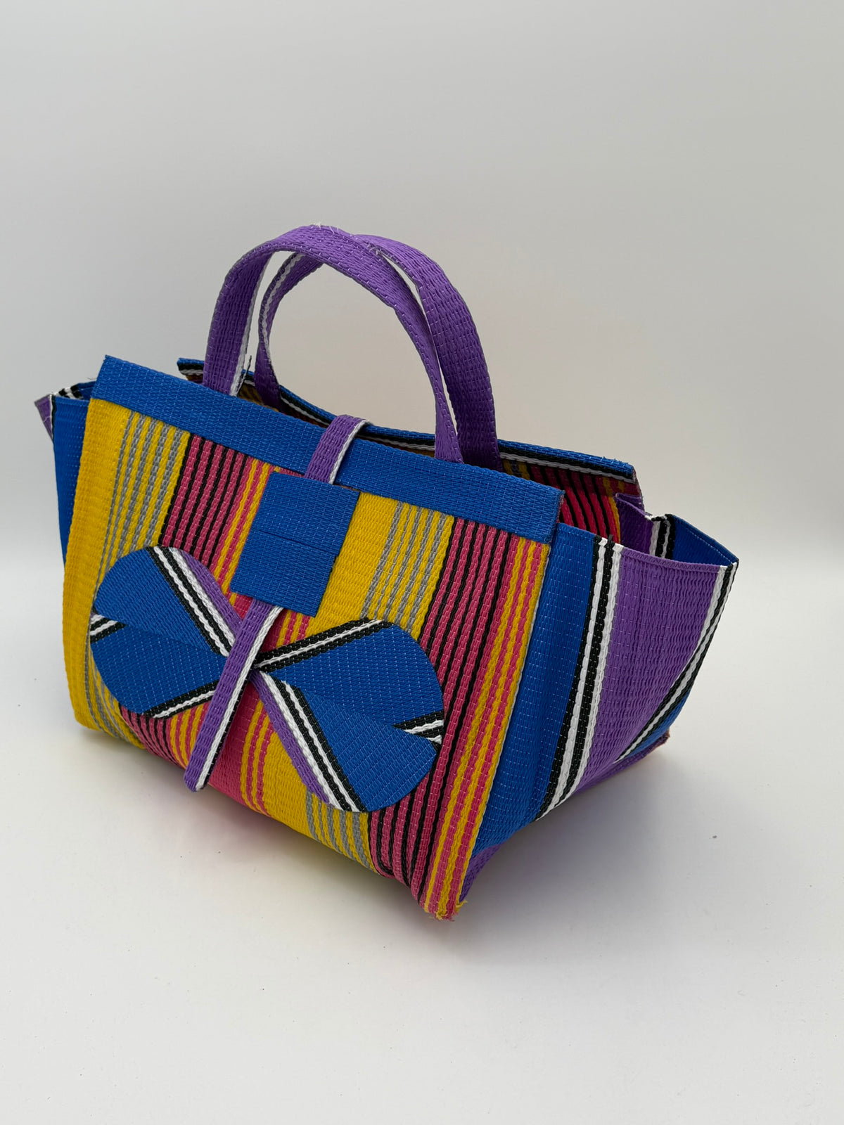 Citrus Large handwoven tote bag by SCRUBIES in Yellow,Blue,Purple,Pink with Stripes design and Bow accent pattern
