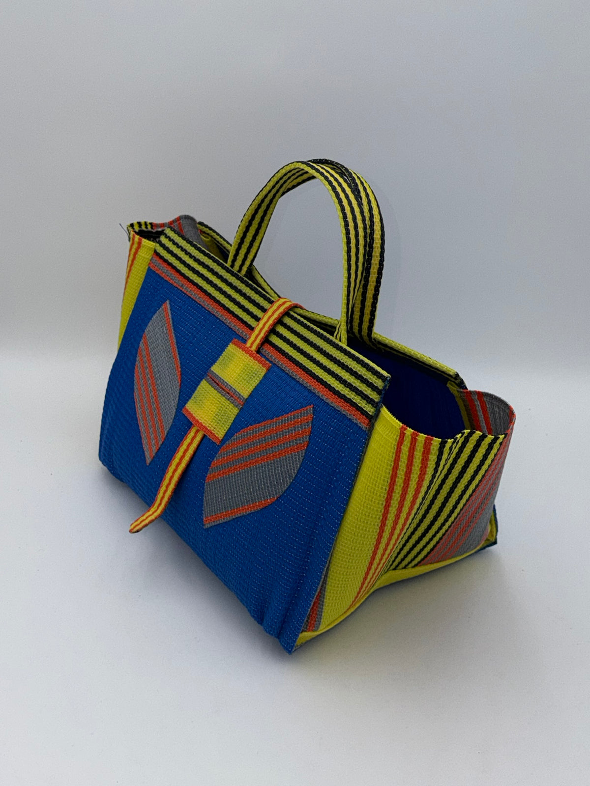 Lagoon Large handwoven tote bag by SCRUBIES in Blue,Yellow,Orange with Solid design and Leaf accent pattern
