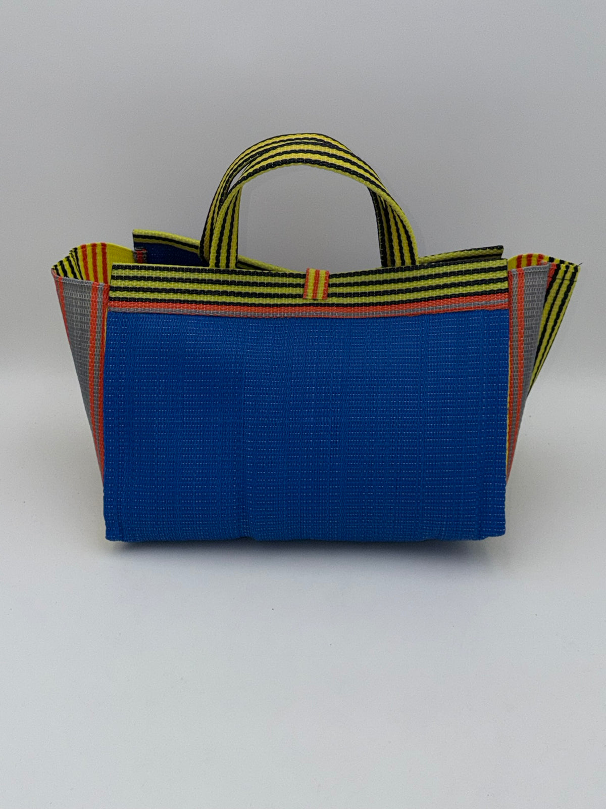 Lagoon Large handwoven tote bag by SCRUBIES in Blue,Yellow,Orange with Solid design and Leaf accent pattern