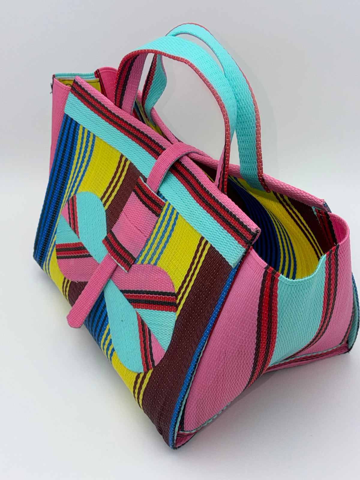 Sunshine Large handwoven tote bag by SCRUBIES in Pink,Teal,Yellow,Blue,Brown with Stripes design and Bow accent pattern