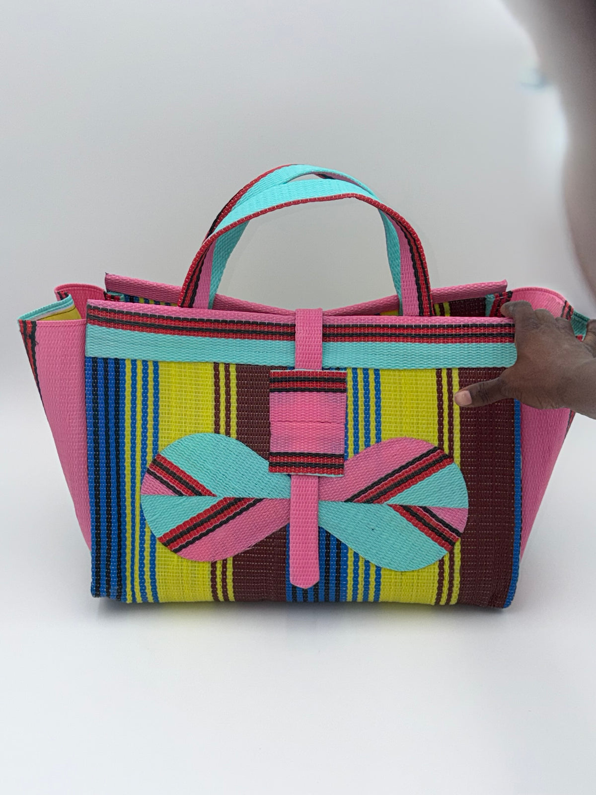 Sunshine Large handwoven tote bag by SCRUBIES in Pink,Teal,Yellow,Blue,Brown with Stripes design and Bow accent pattern